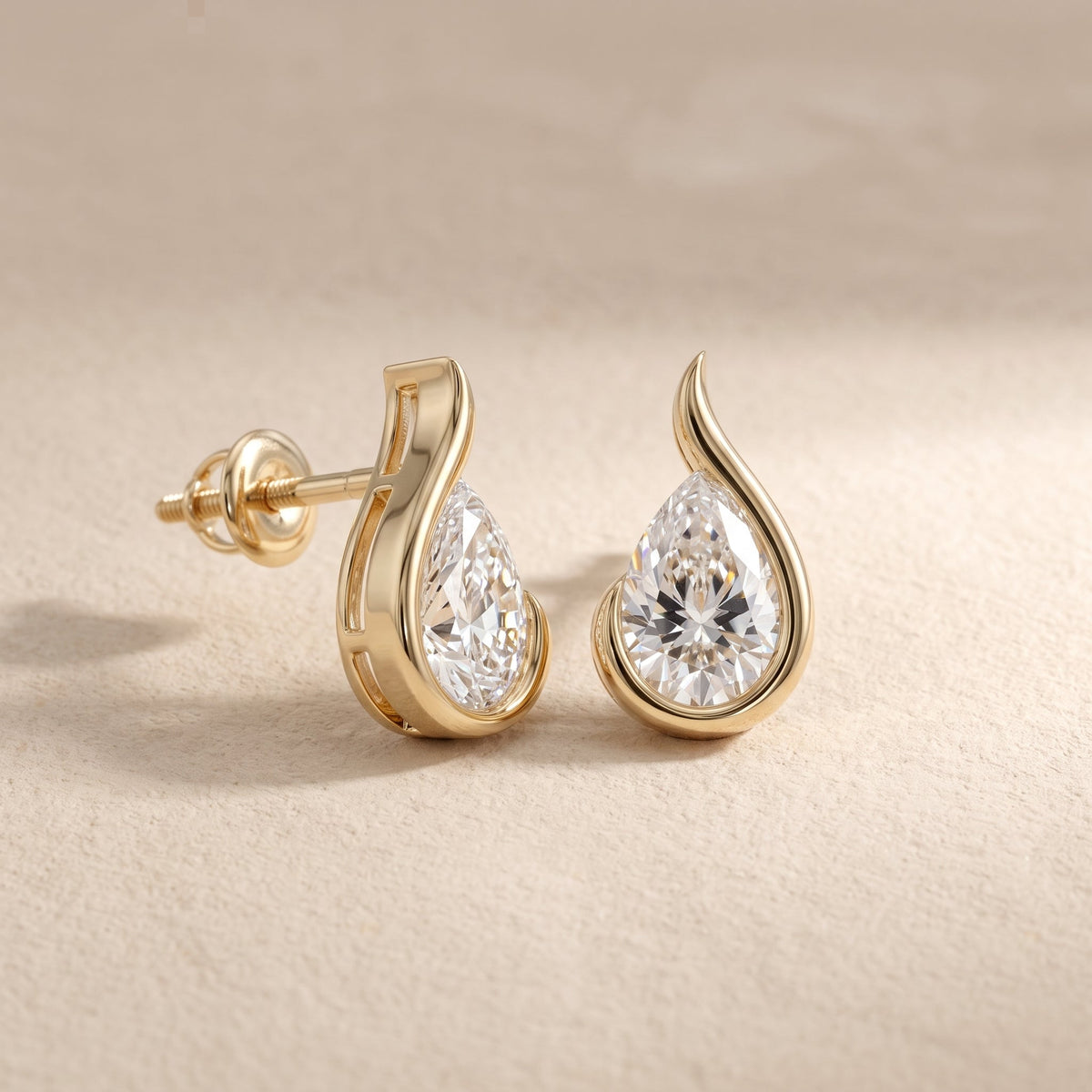 Yellow Gold Pear Cut Moissanite Stud Earrings