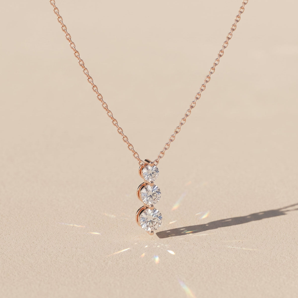 Rose Gold Round Moissanite Three Stone Drop Pendant Necklace