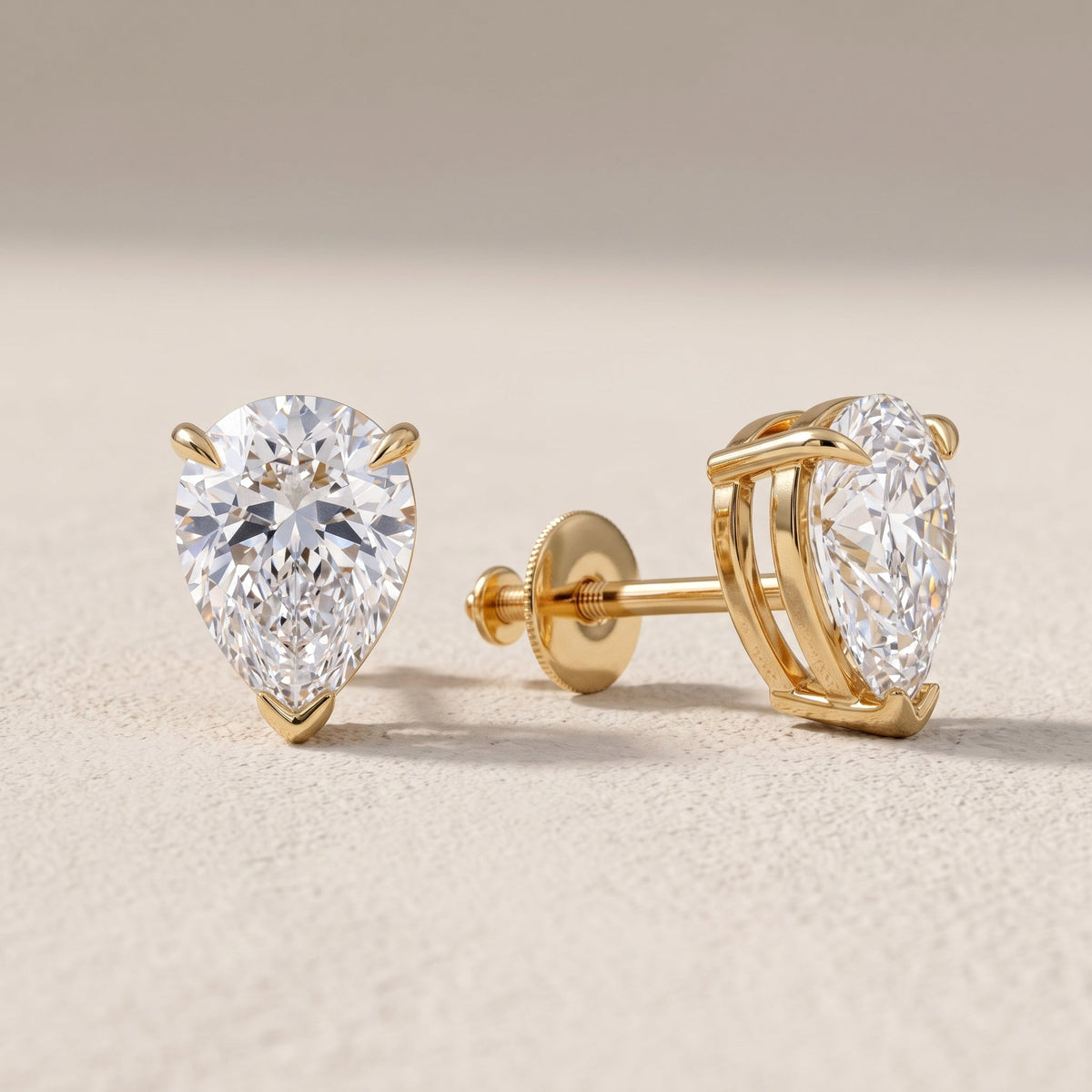 Yellow Gold Pear Cut Moissanite Stud Earrings with Screw Back