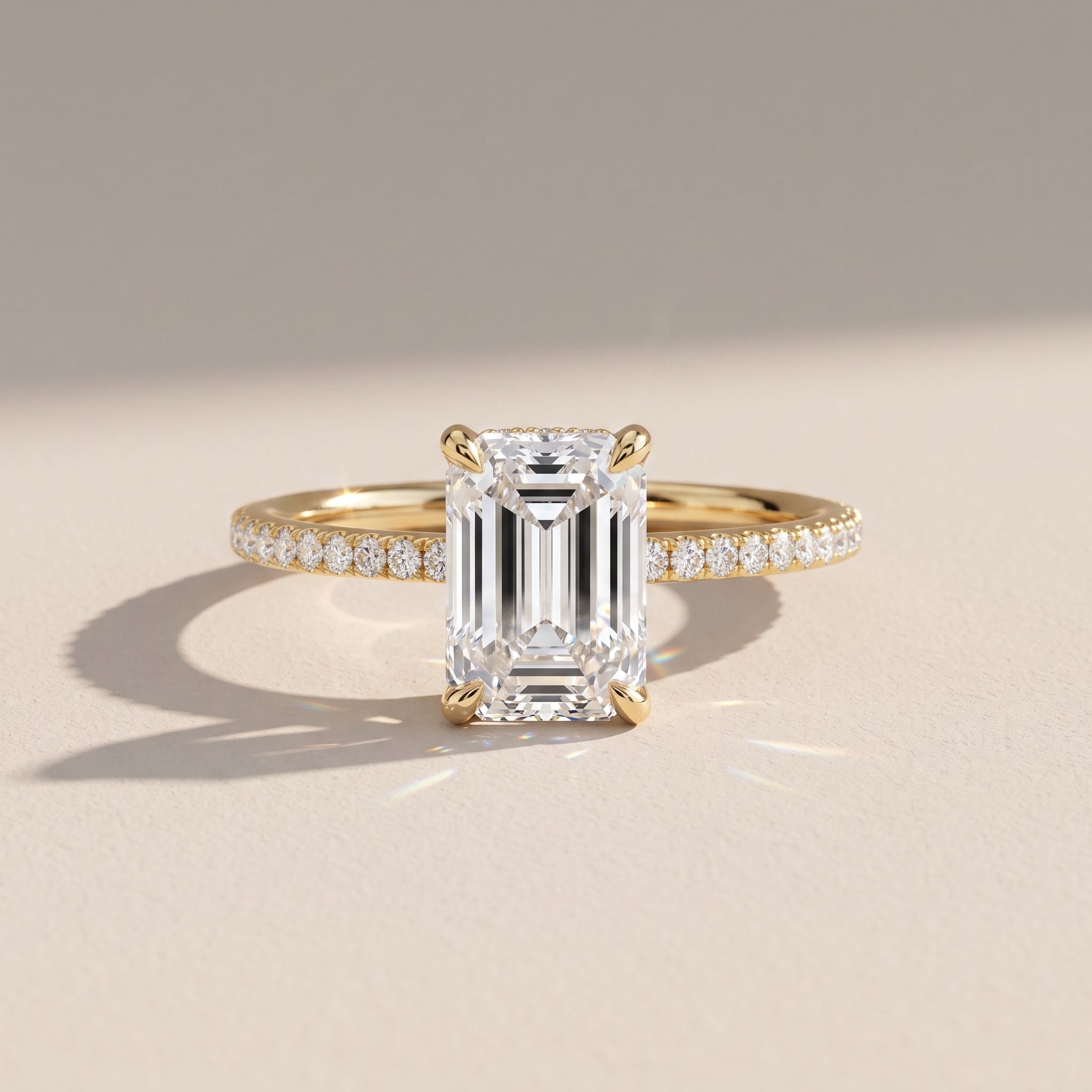 Yellow Gold Emerald Cut Moissanite Engagement Ring