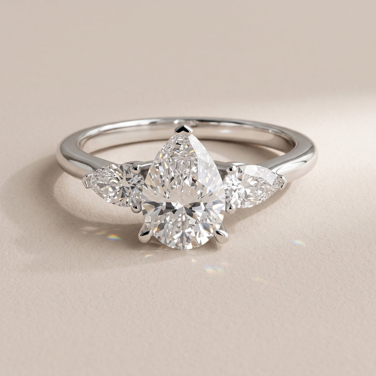 White Gold Pear Cut Moissanite Three Stone Engagement Ring