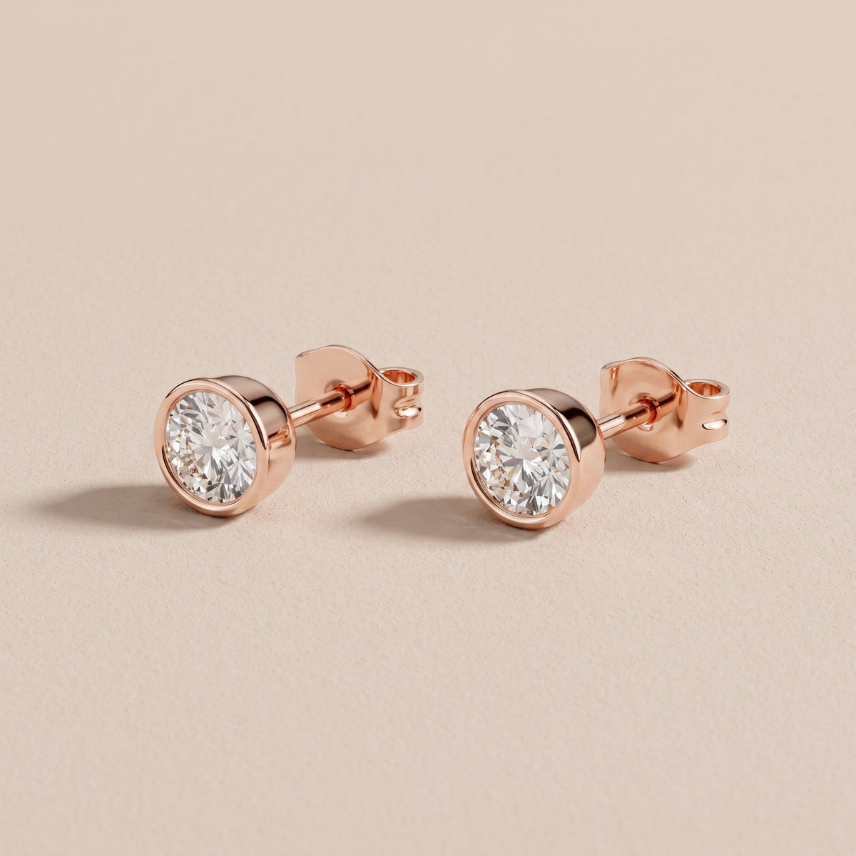 Rose Gold Round Moissanite Bezel Stud Earrings