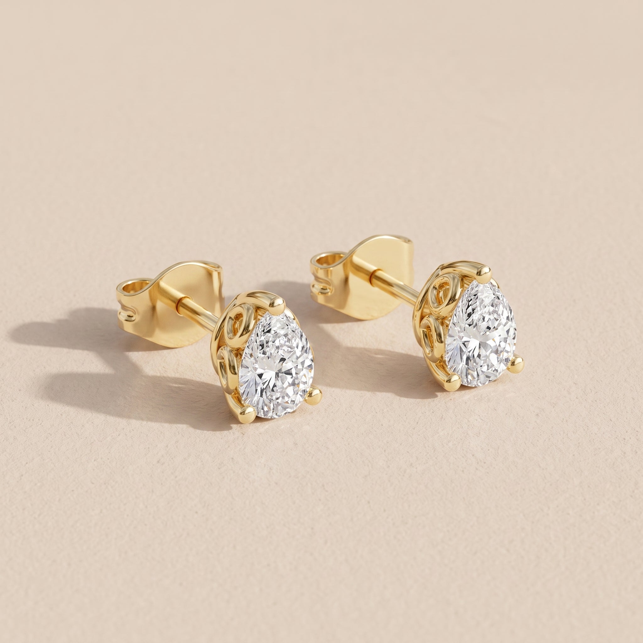 Yellow Pear Cut Moissanite Stud Earrings