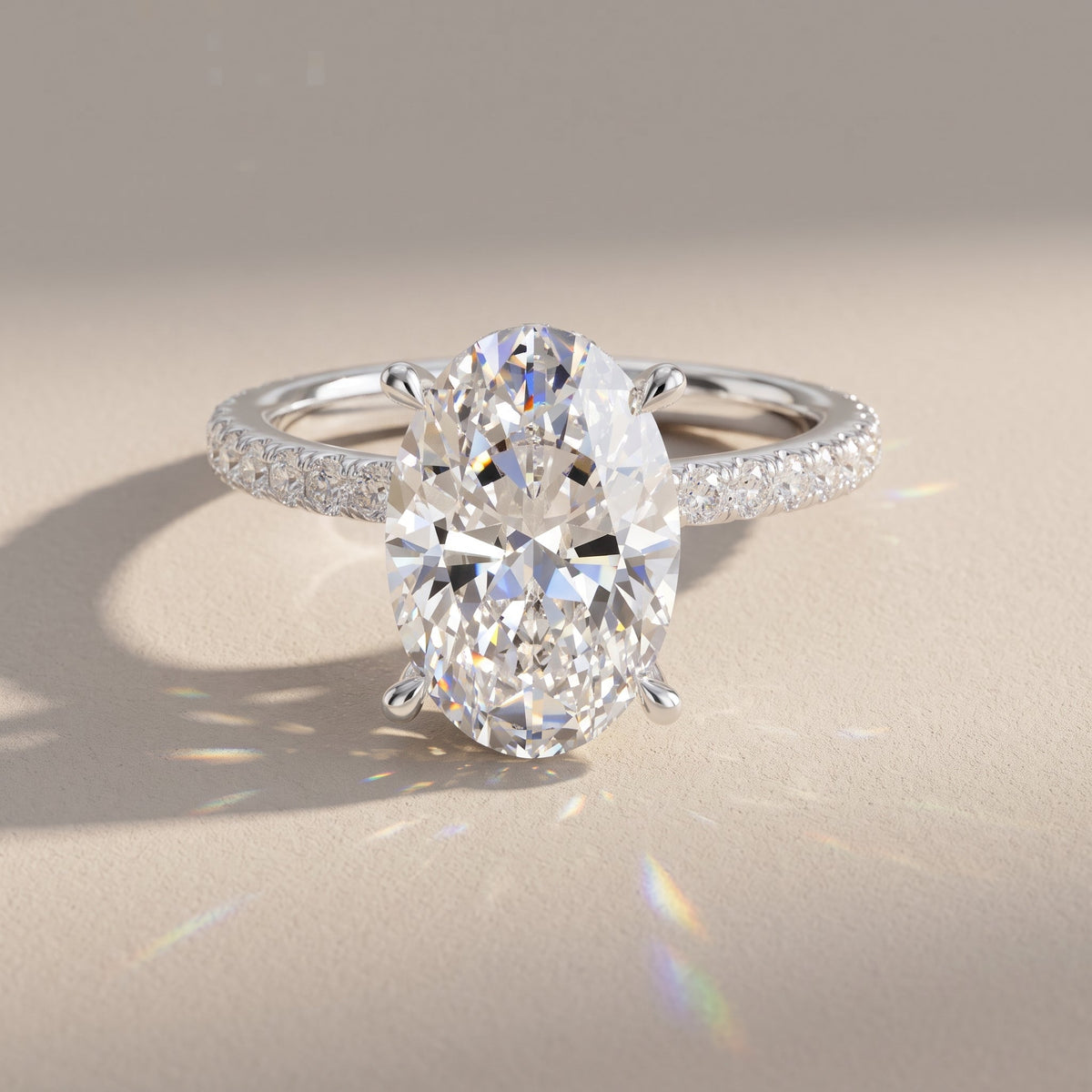White Gold Oval Cut Moissanite Engagement Ring with Pavé Band