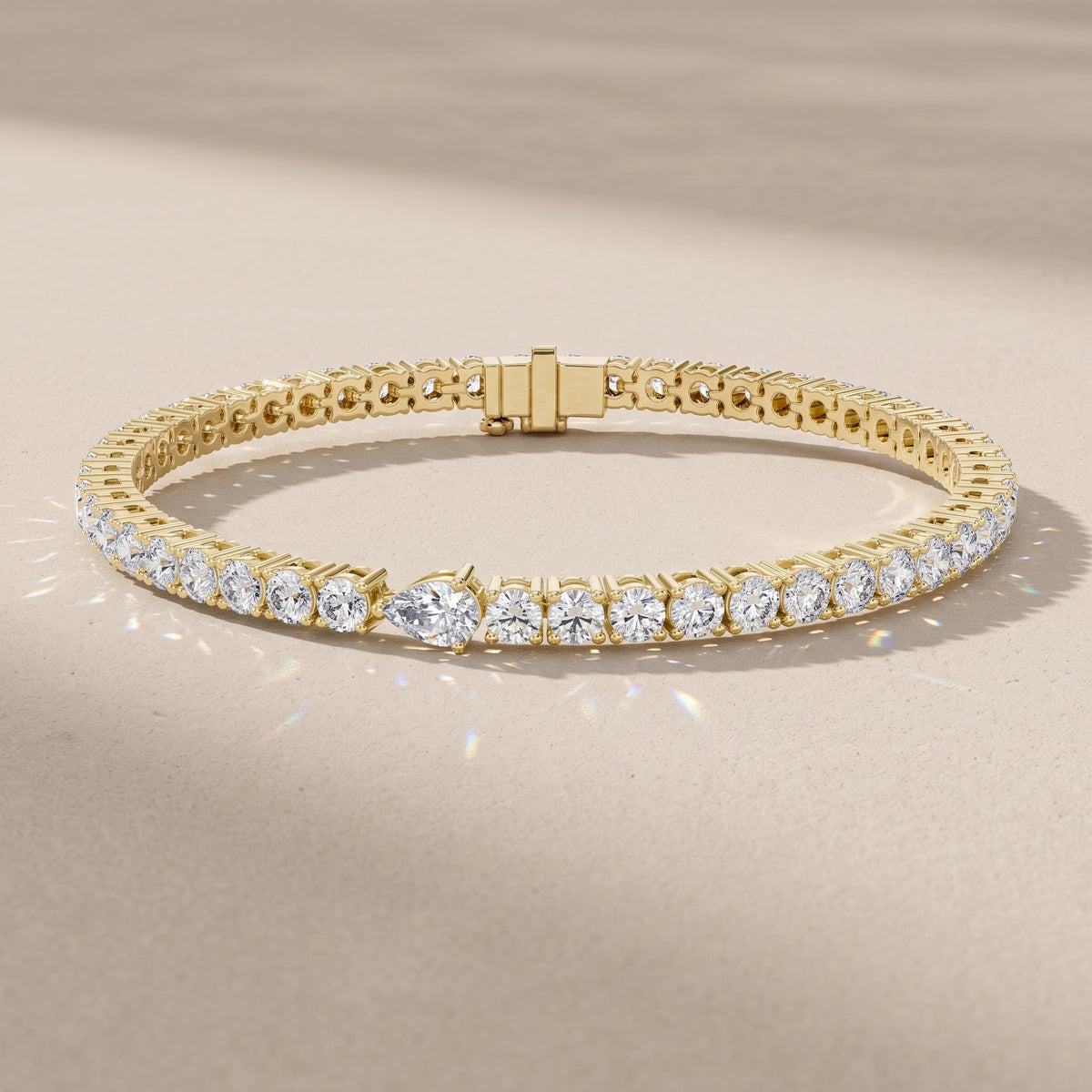 Yellow Gold Pear & Round Moissanite Tennis Bracelet