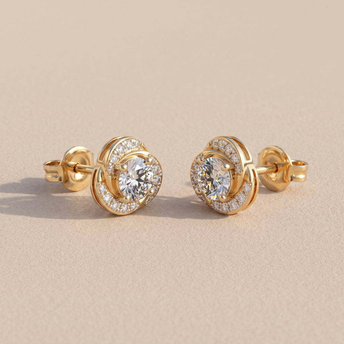 Yellow Gold Round Moissanite Stud Earrings with Swirl Halo Design
