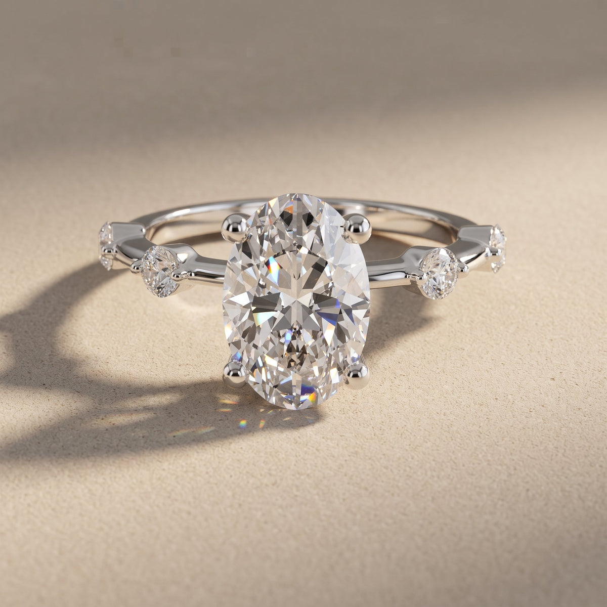 White Metal Oval Cut Moissanite Engagement Ring with Accent Stones