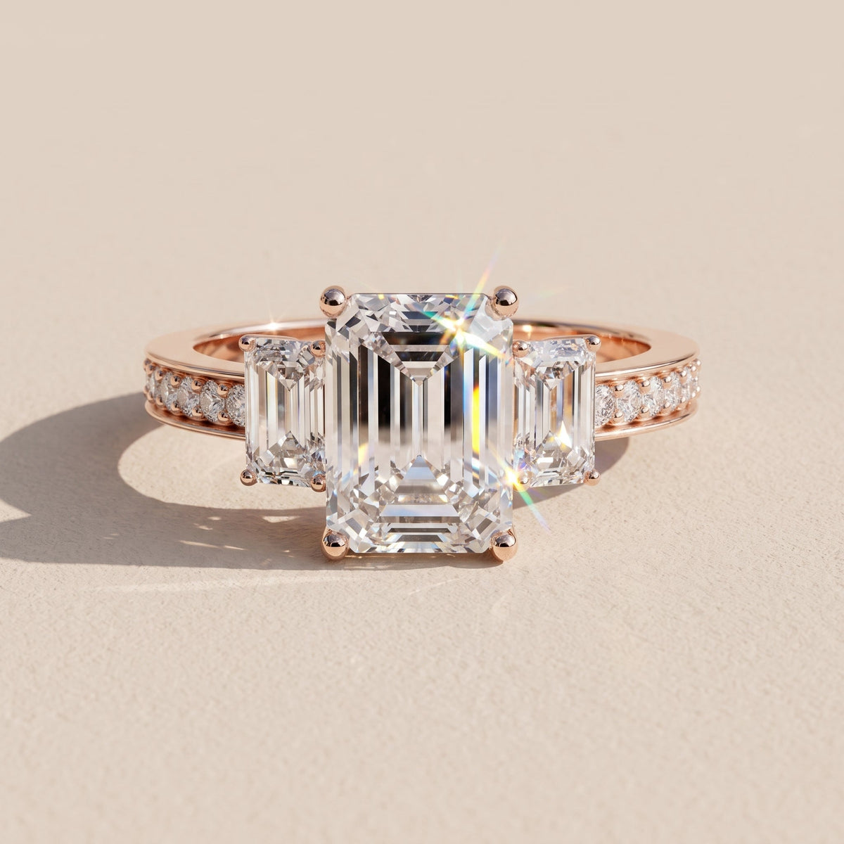 Rose Gold Emerald Cut Moissanite Three Stone Engagement Ring