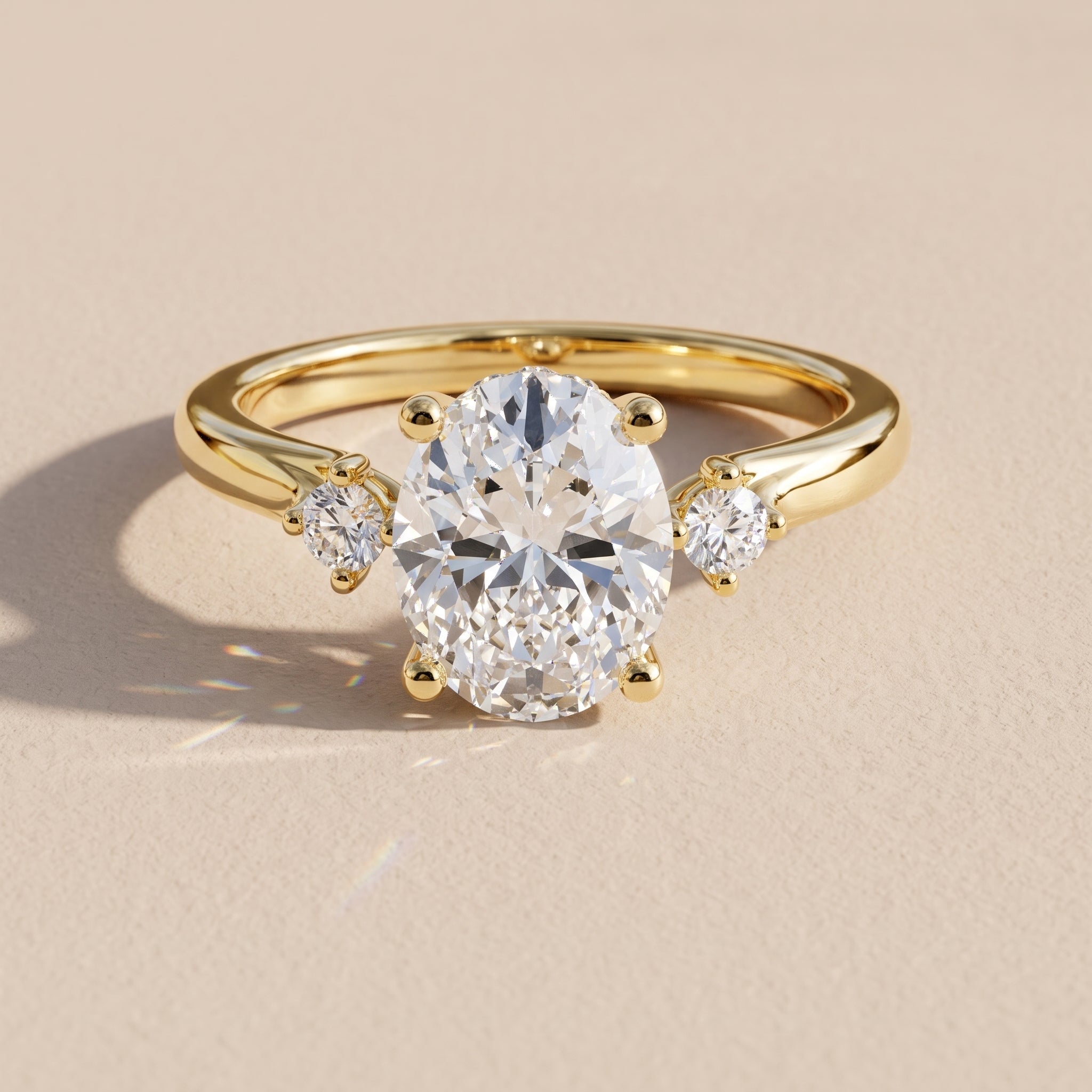 Yellow Gold Oval Moissanite Three Stone Engagement Ring