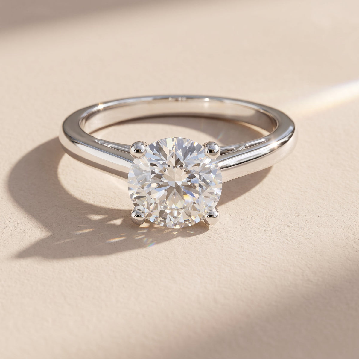 White Metal Round Cut Moissanite Solitaire Ring