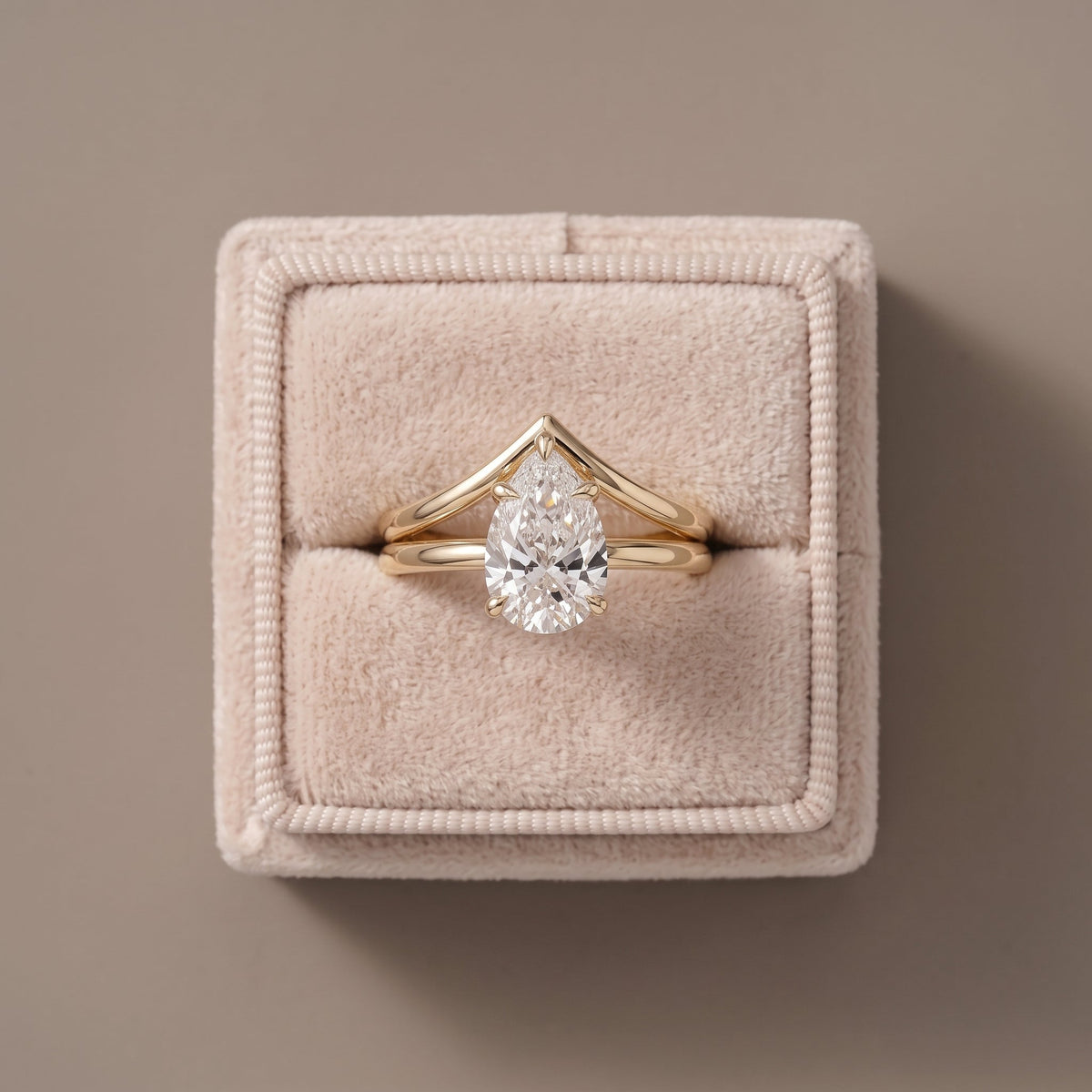 Yellow Gold Pear Cut Moissanite Engagement Ring with Chevron Band