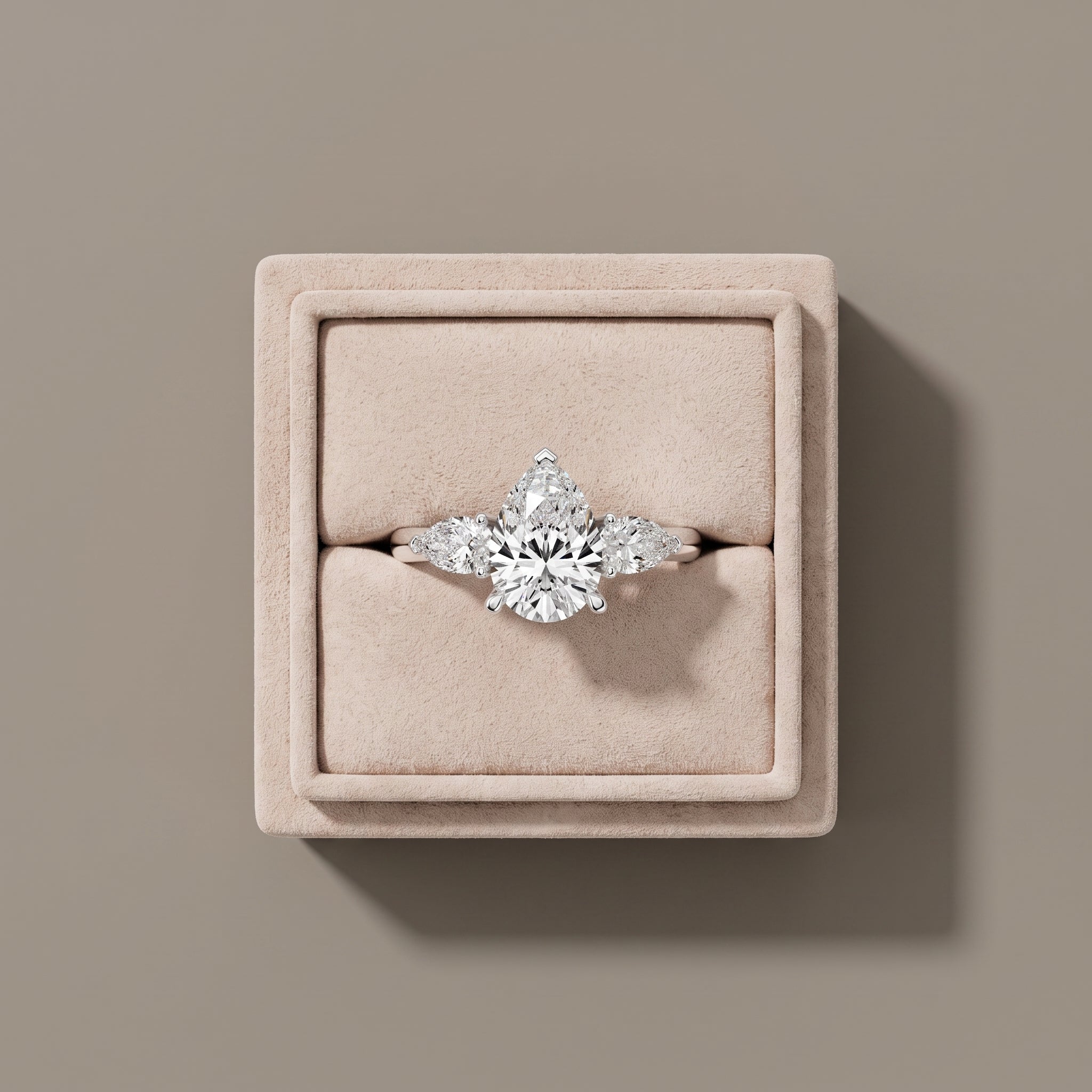 White Gold Pear Cut Moissanite Three Stone Engagement Ring