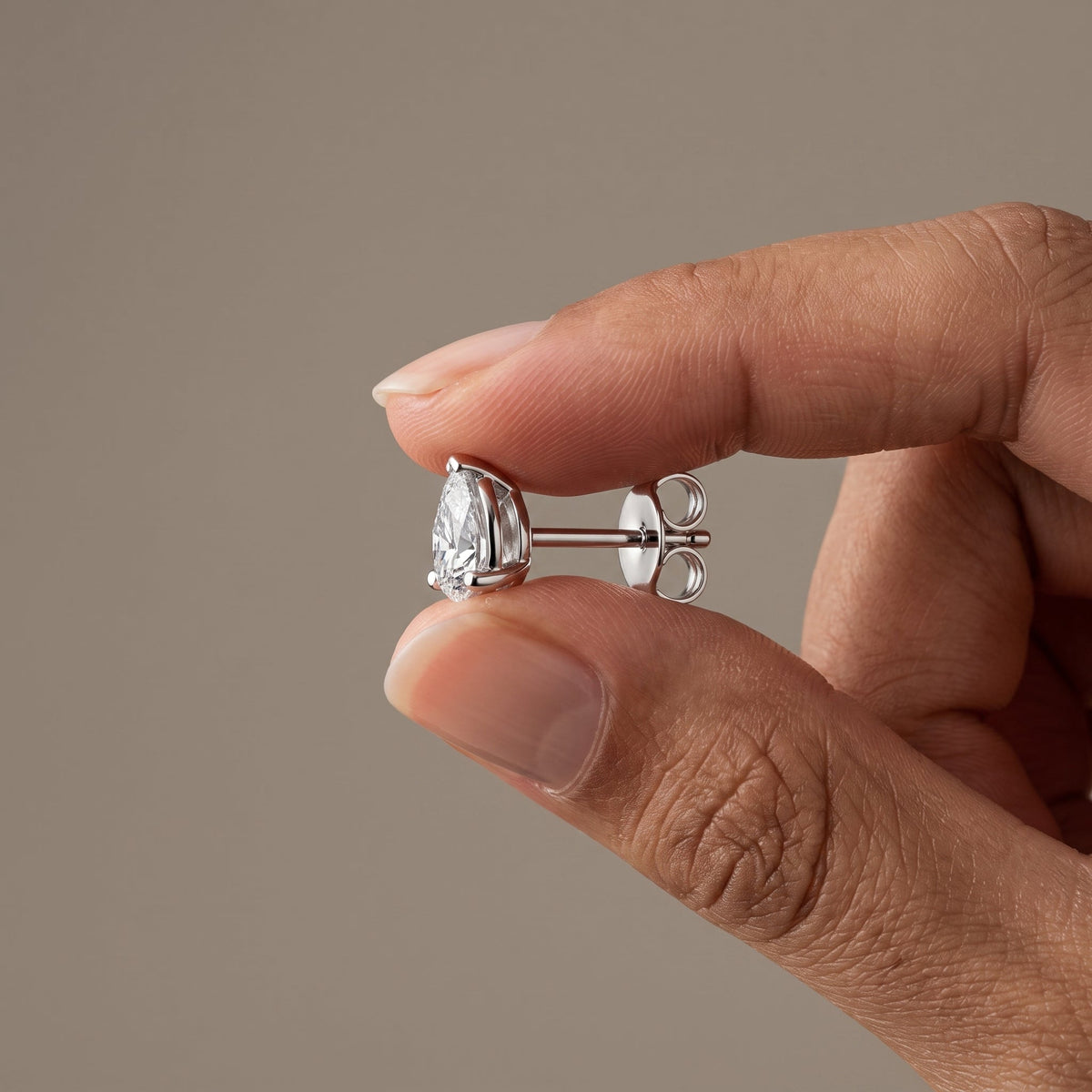 White Pear Cut Moissanite Stud Earrings