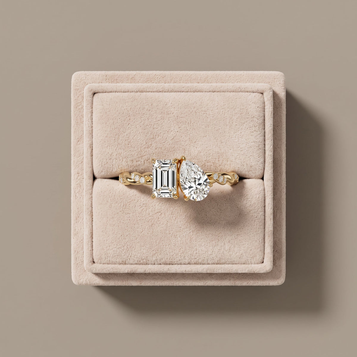 Yellow Gold Emerald & Pear Cut Moissanite Twist Ring