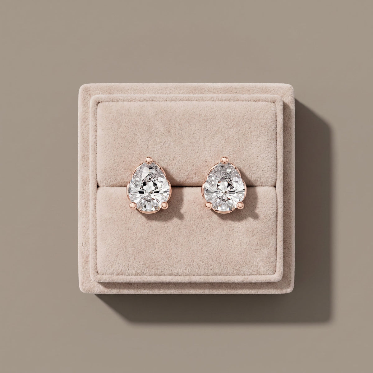 Rose Gold Pear Cut Moissanite Stud Earrings