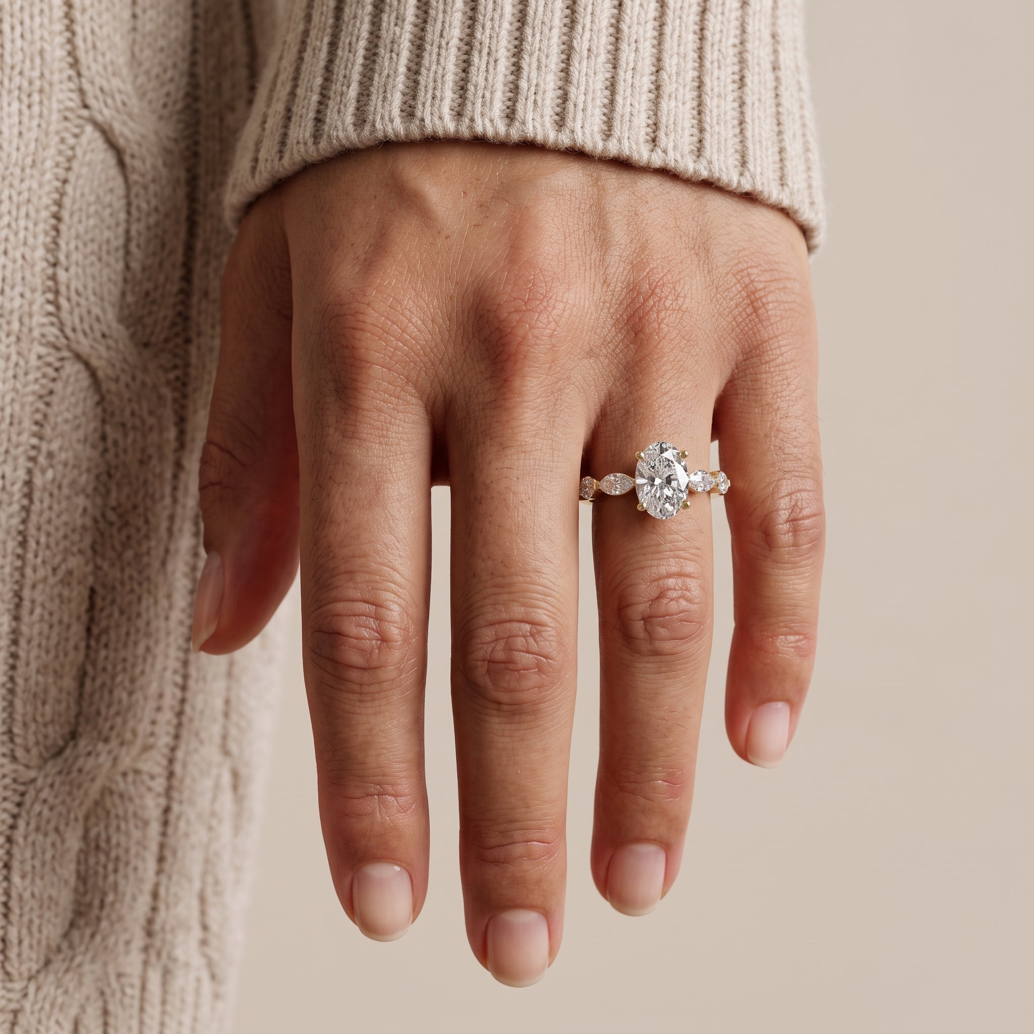 Yellow Gold Oval Moissanite Engagement Ring with Marquise Accents