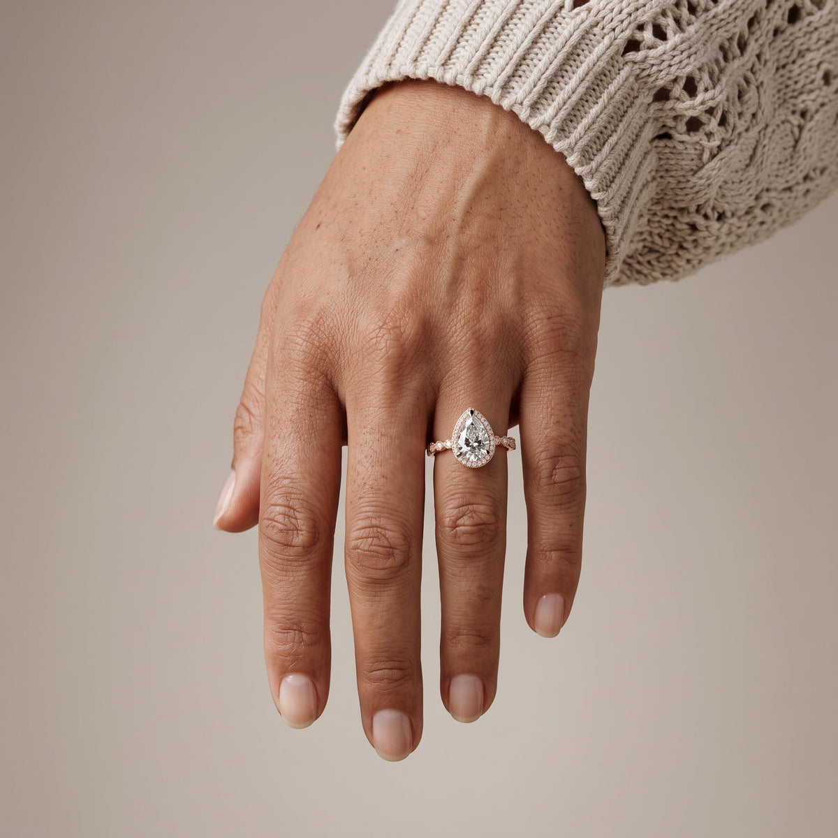 Rose Gold Pear Cut Moissanite Halo Engagement Ring