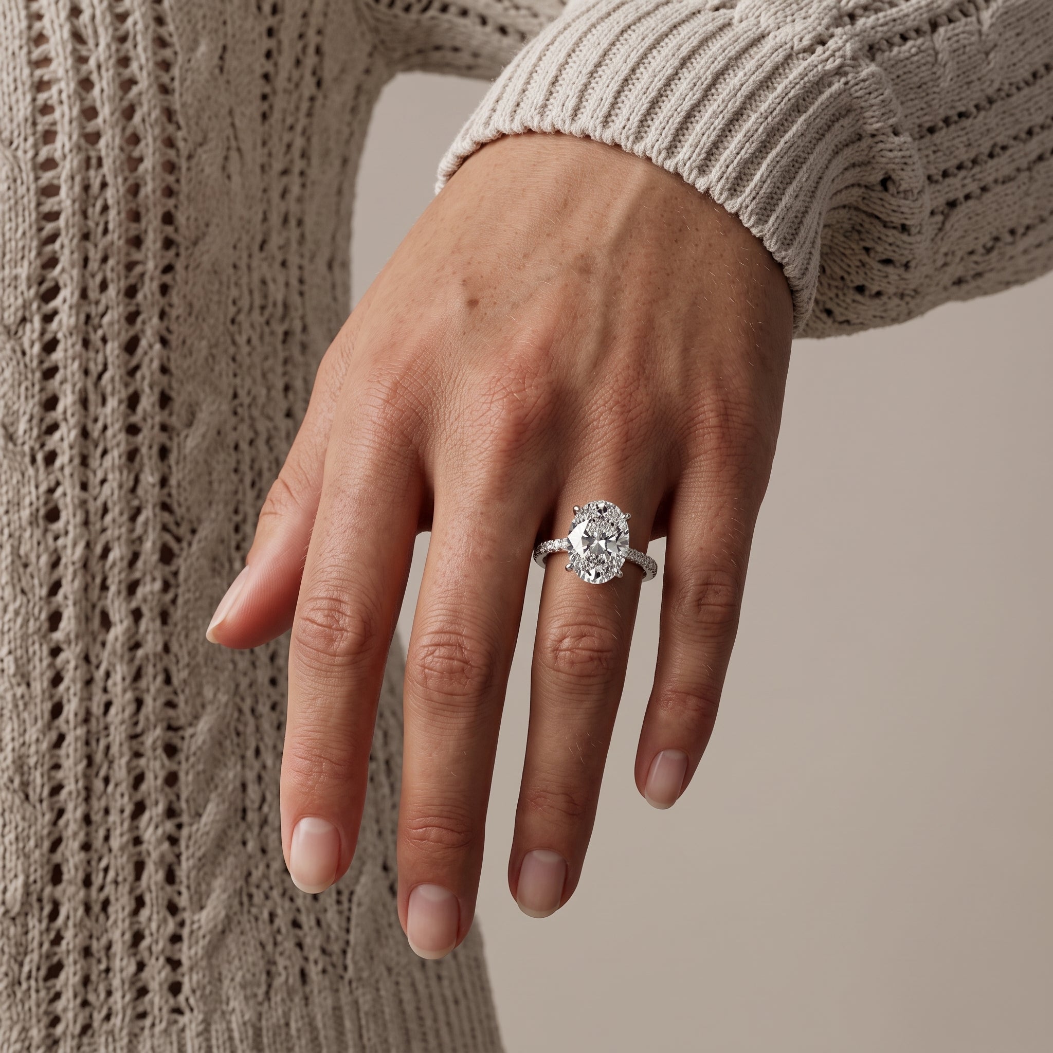 White Gold Oval Cut Moissanite Engagement Ring with Pavé Band