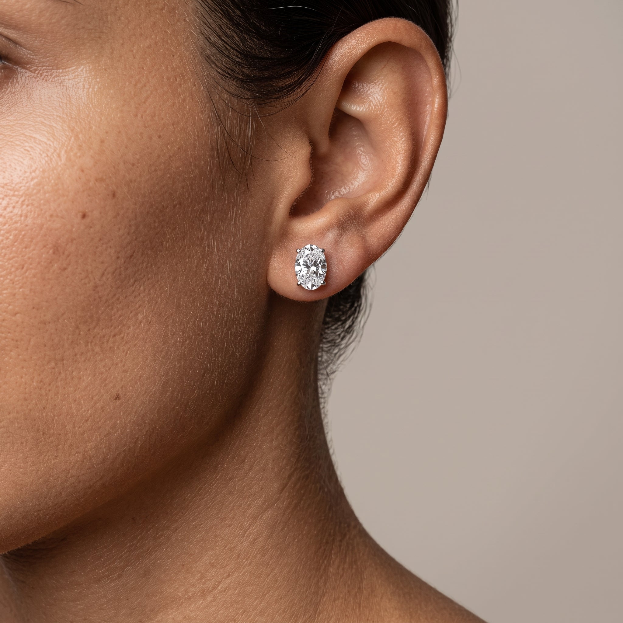 White Metal Oval Cut Moissanite Stud Earrings