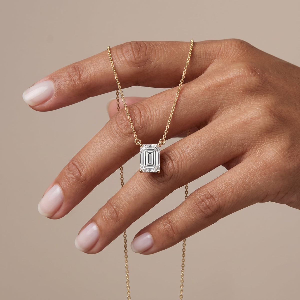 Yellow Gold Emerald Cut Moissanite Solitaire Pendant Necklace