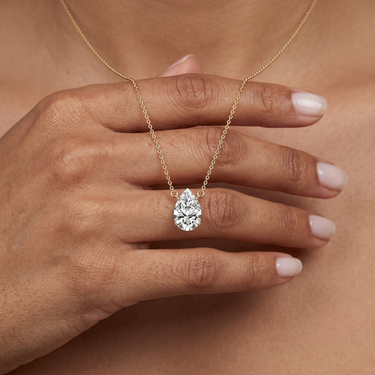 Yellow Gold Pear Cut Moissanite Pendant Necklace