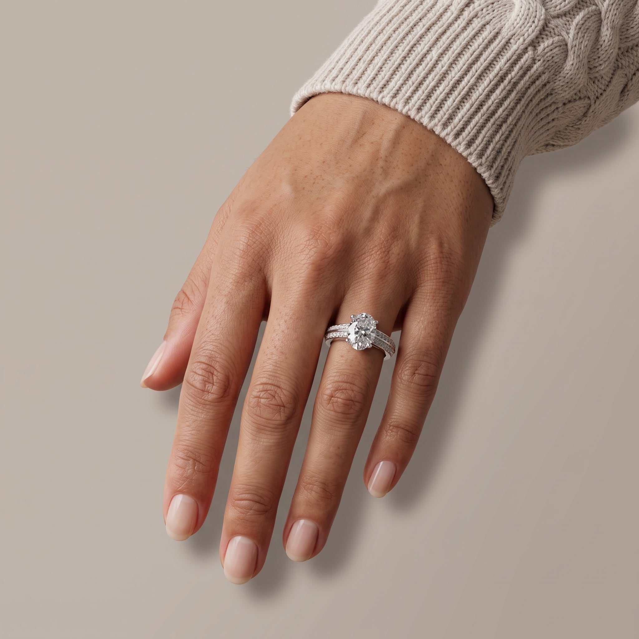 White Gold Oval Cut Moissanite Engagement Ring with Pavé Band