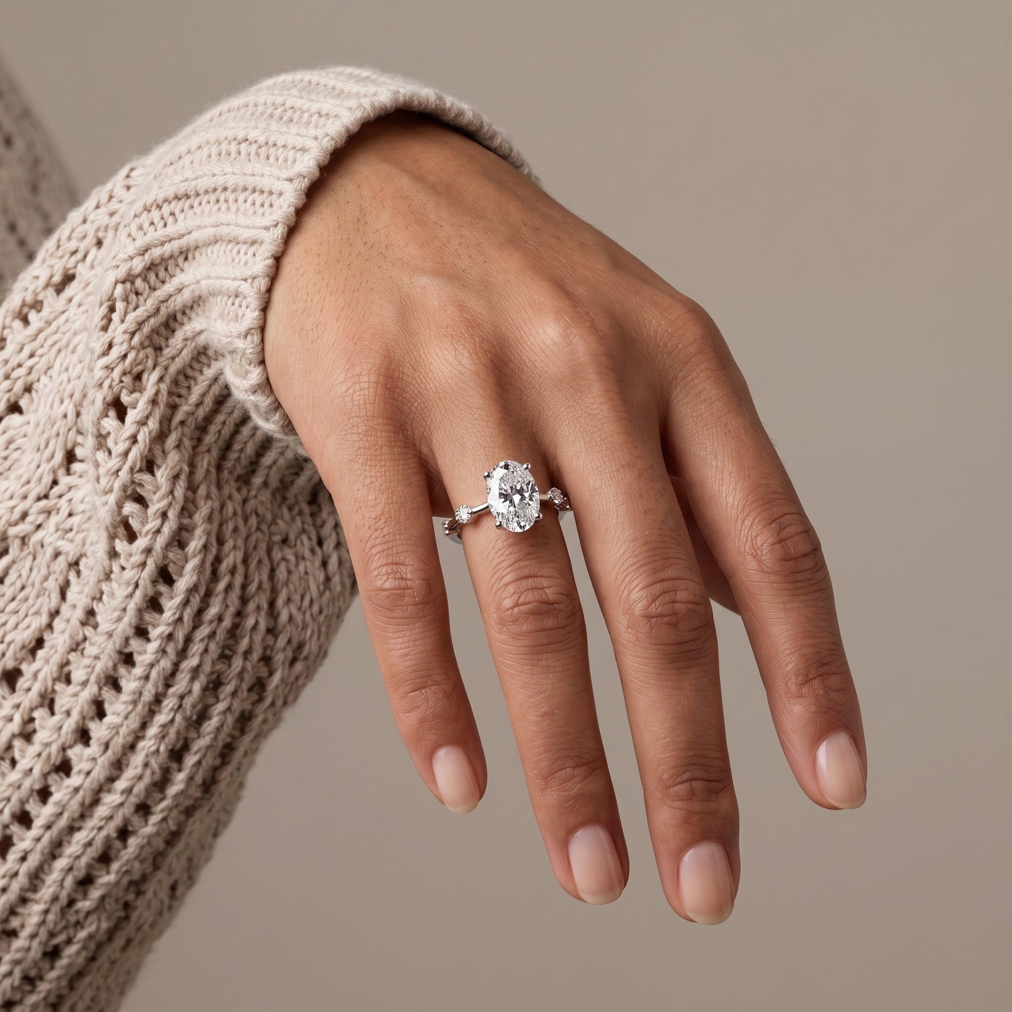White Metal Oval Cut Moissanite Engagement Ring with Accent Stones