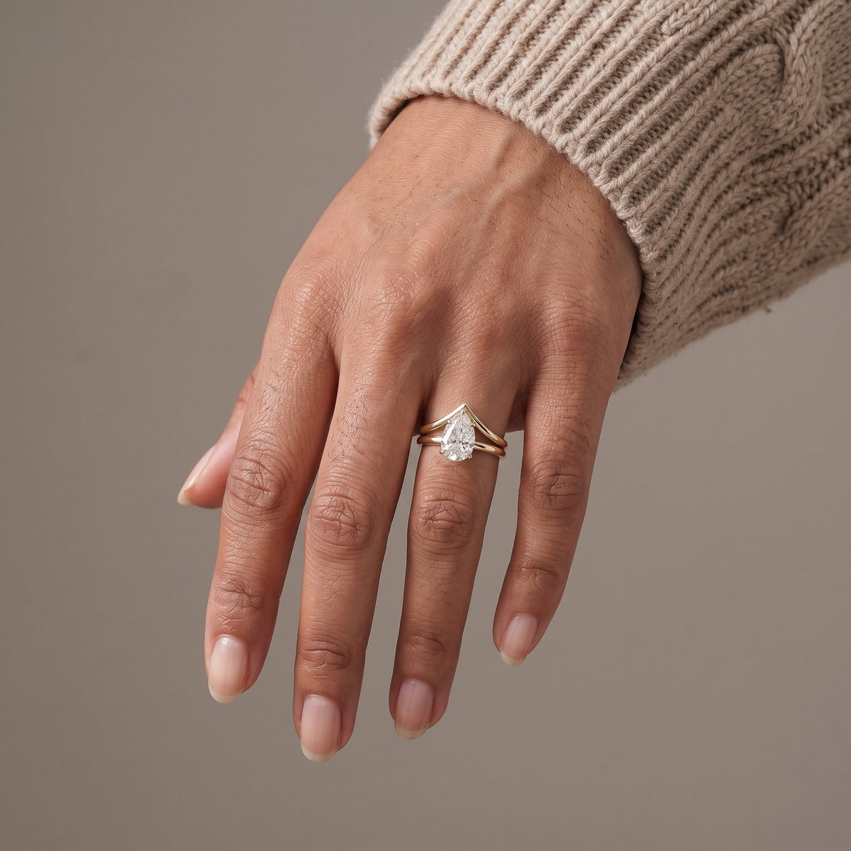 Yellow Gold Pear Cut Moissanite Engagement Ring with Chevron Band