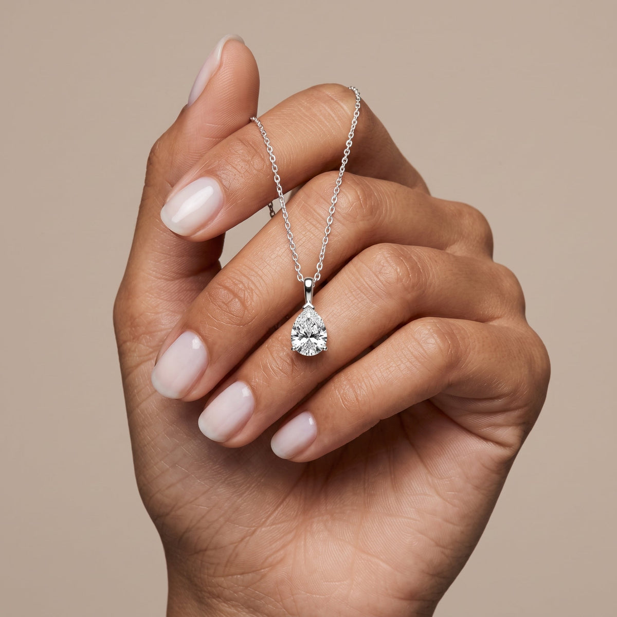 White Metal Pear Cut Moissanite Pendant Necklace
