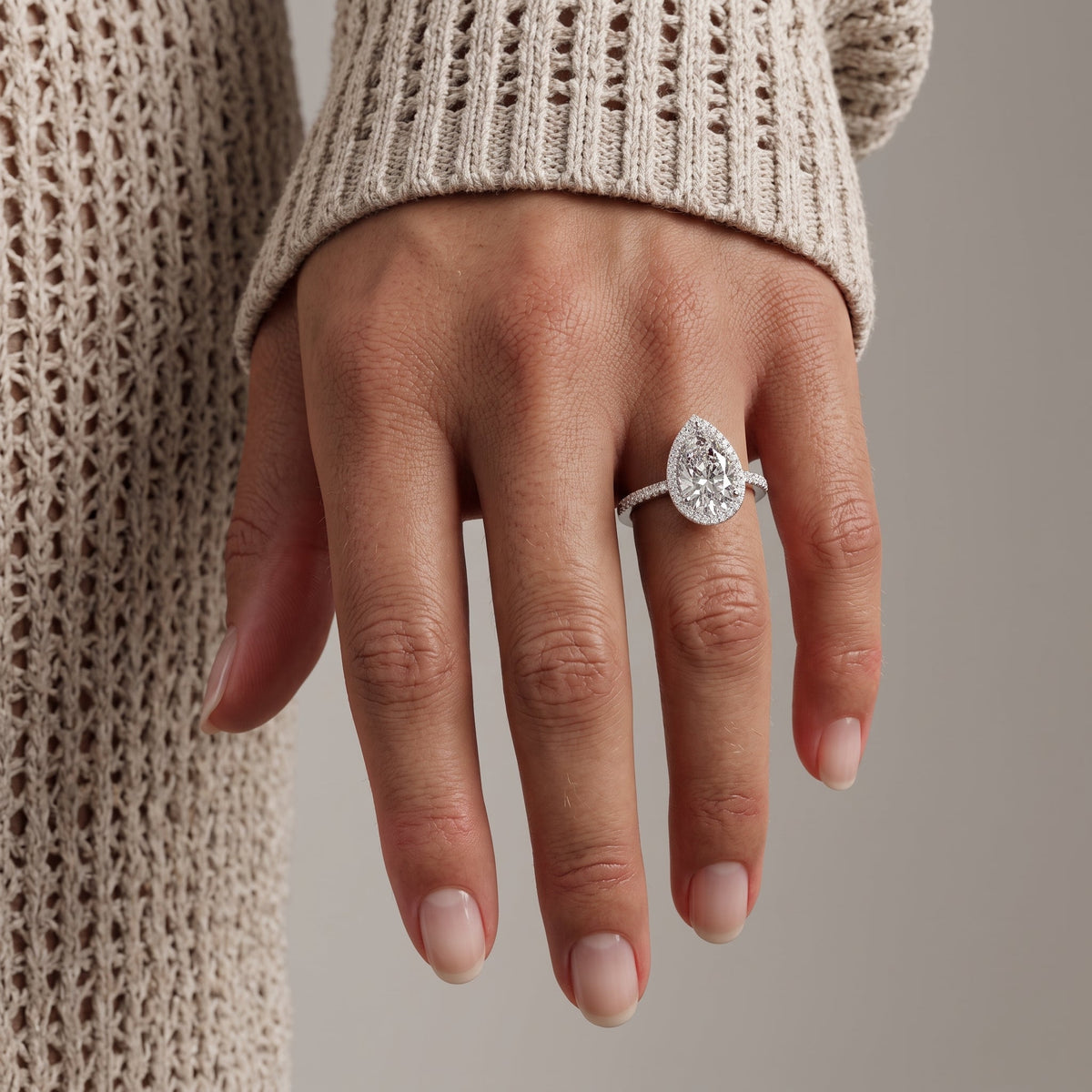 White Gold Tone Pear Moissanite Halo Engagement Ring