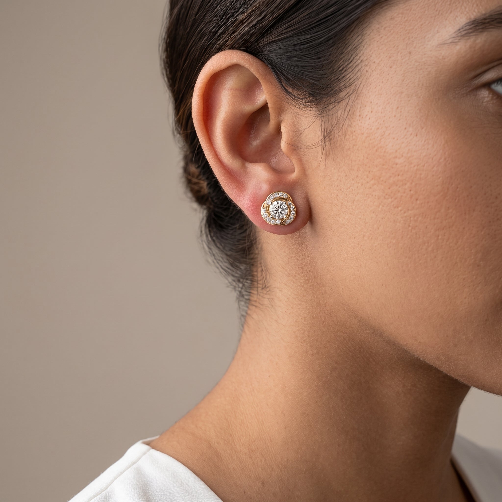 Yellow Gold Round Moissanite Stud Earrings with Swirl Halo Design