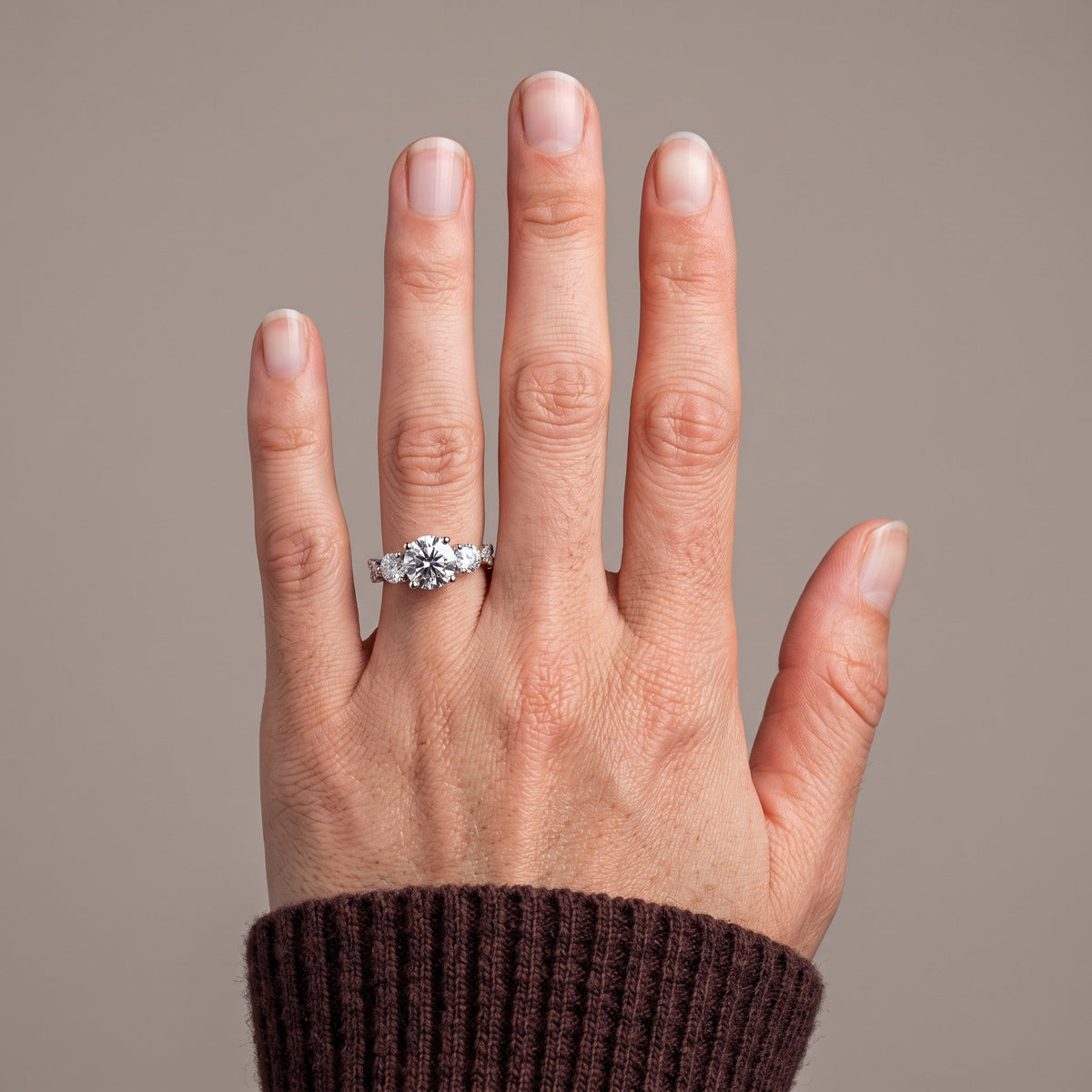 White Metal Round Moissanite Three-Stone Engagement Ring