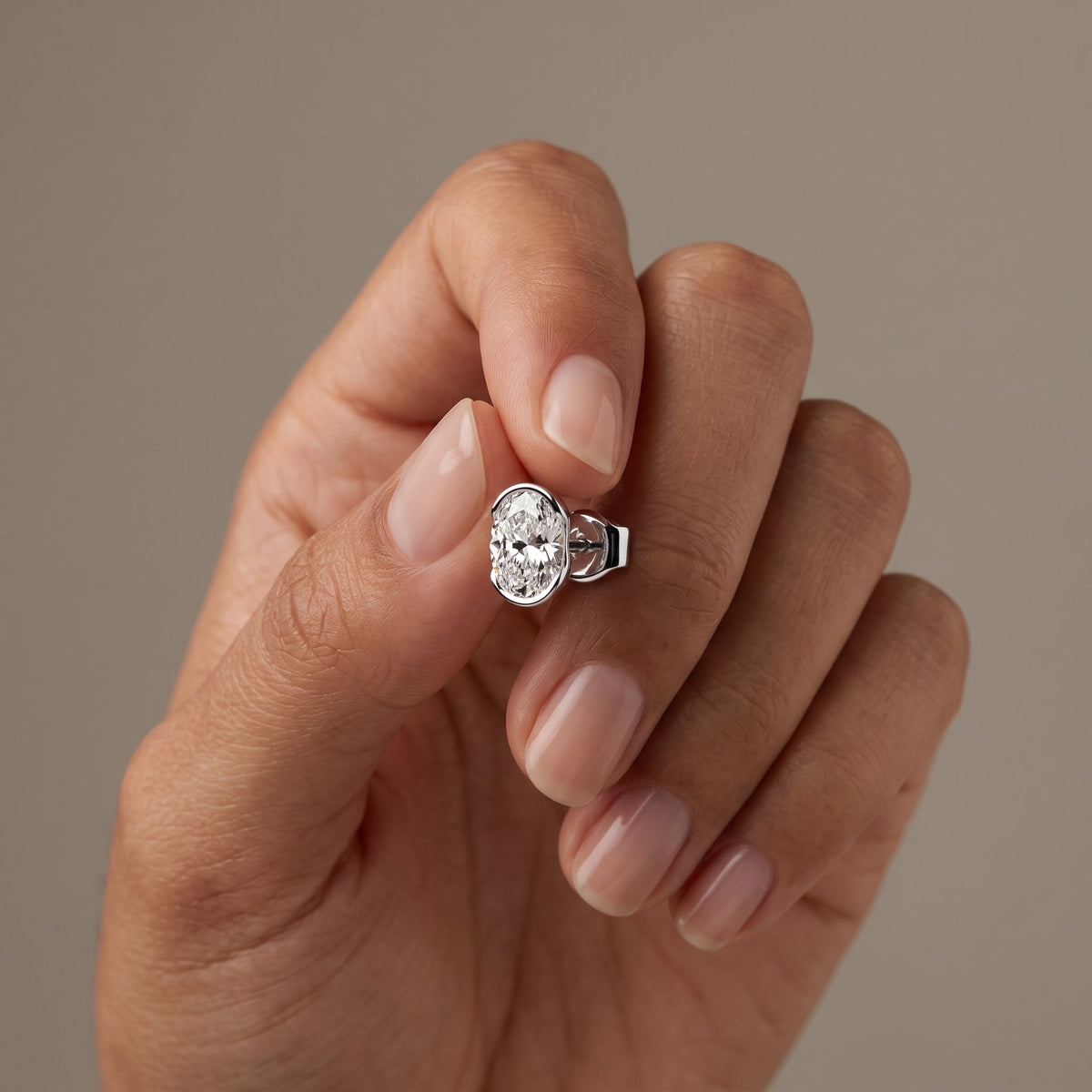 White Metal Oval Cut Moissanite Stud Earrings