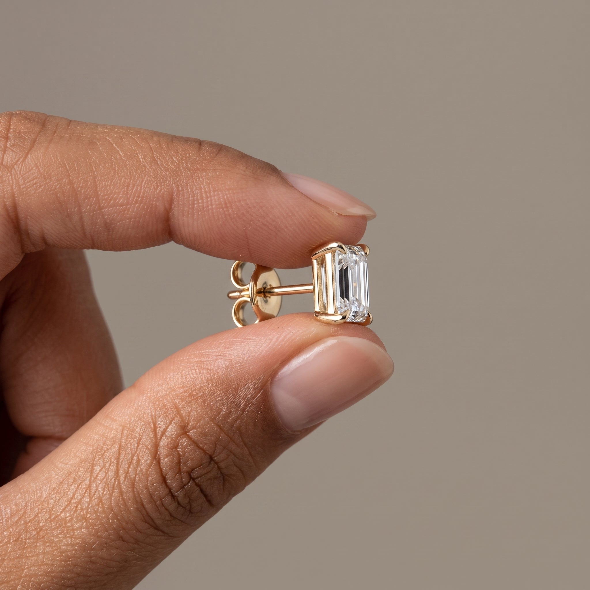 Yellow Gold Emerald Cut Moissanite Stud Earrings