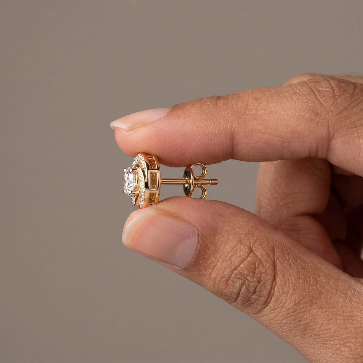 Yellow Gold Round Moissanite Stud Earrings with Swirl Halo Design