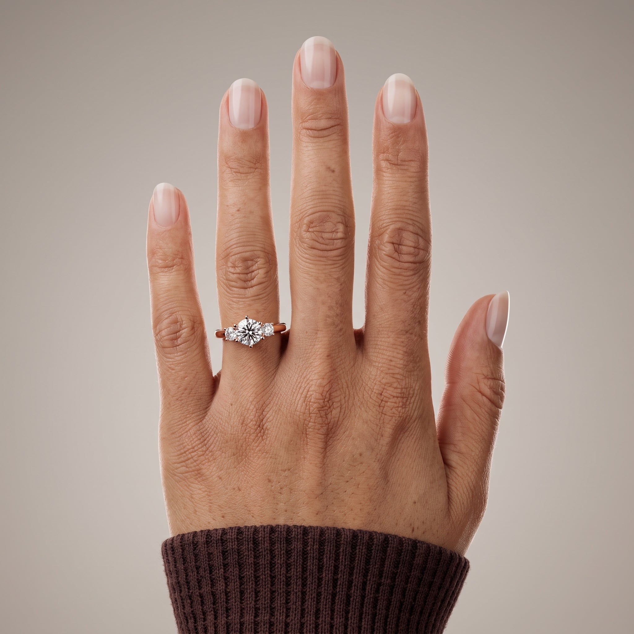 Rose Gold Round Moissanite Three Stone Engagement Ring