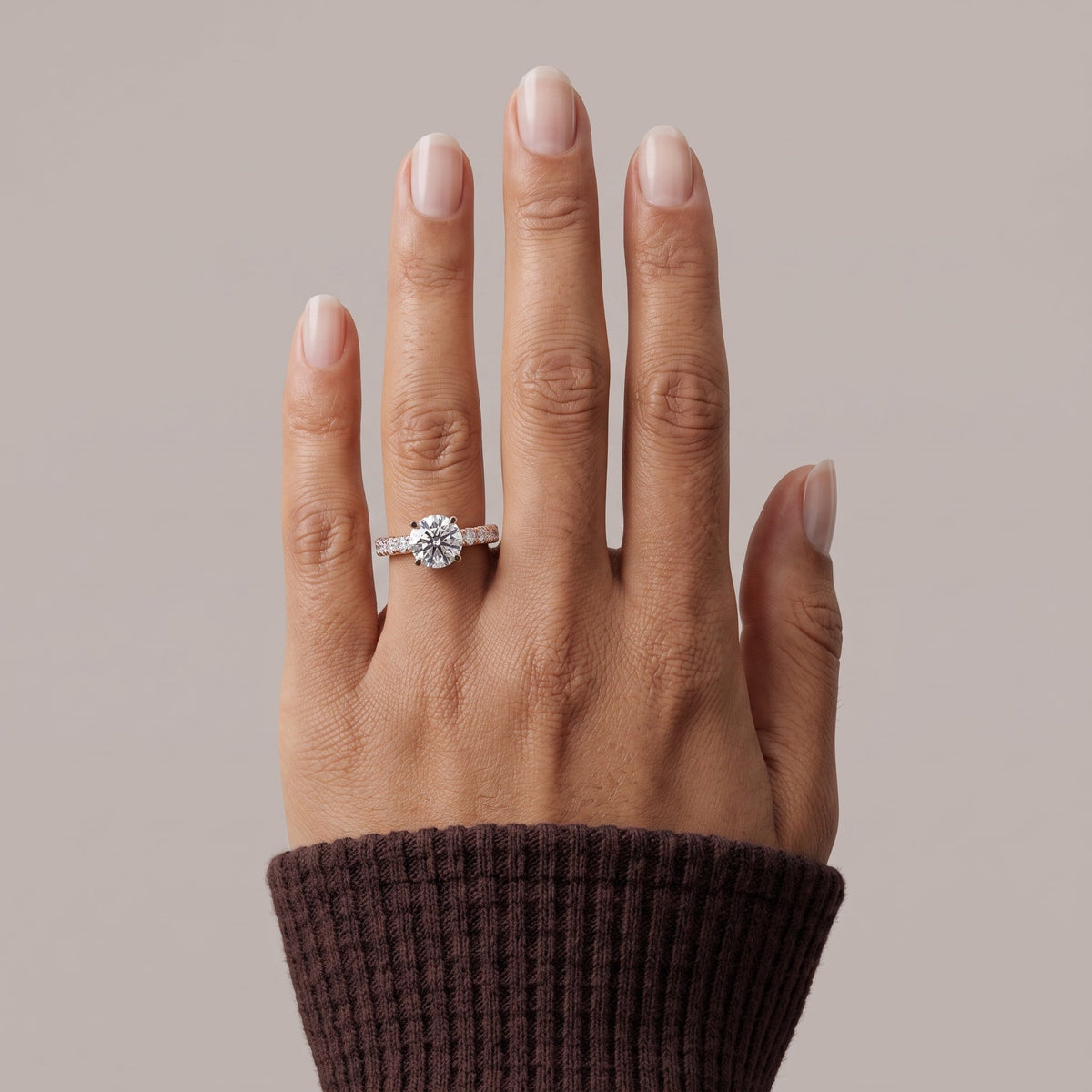 Rose Gold Round Cut Moissanite Engagement Ring with Side Stones