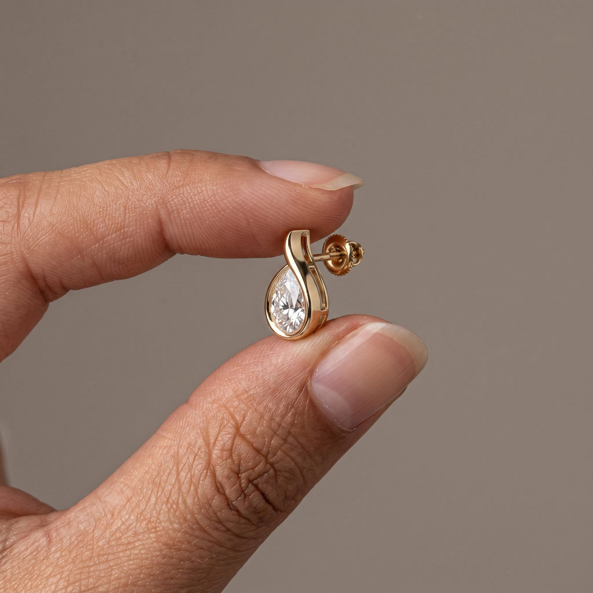 Yellow Gold Pear Cut Moissanite Stud Earrings