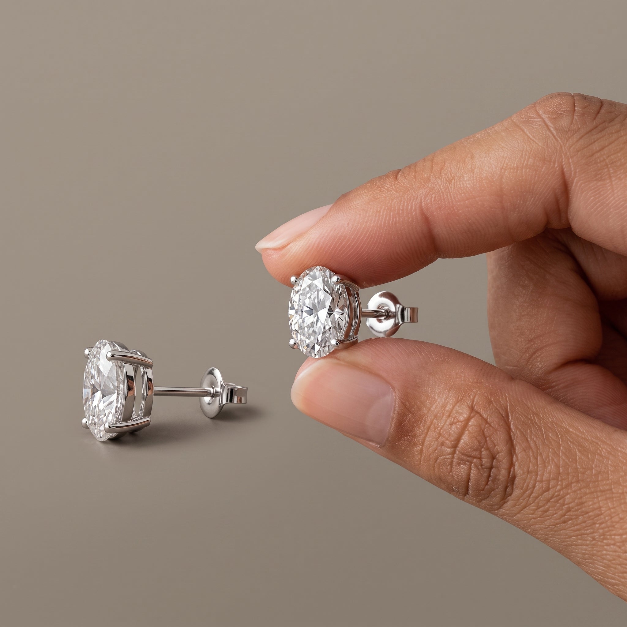 White Metal Oval Cut Moissanite Stud Earrings