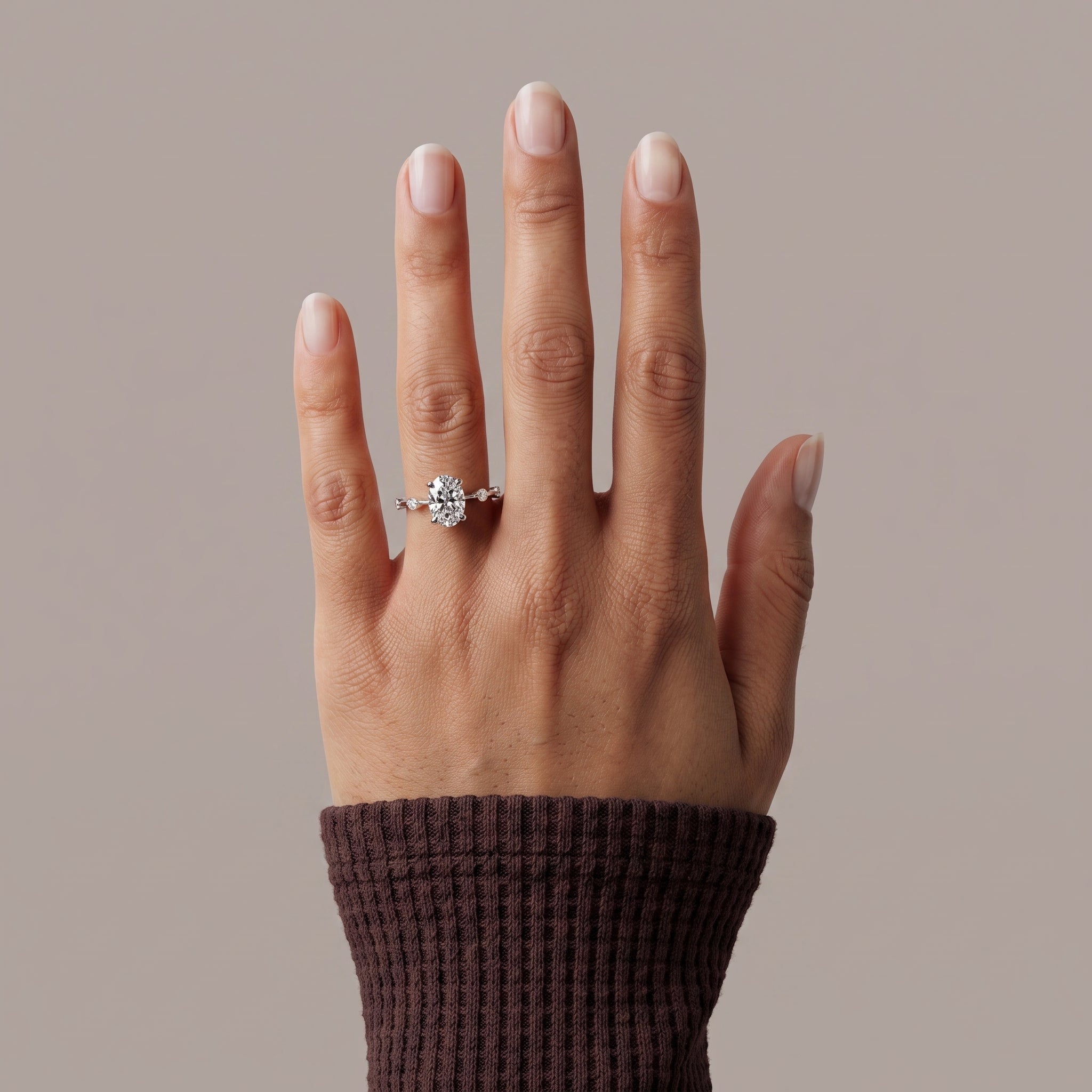 White Metal Oval Cut Moissanite Engagement Ring with Accent Stones
