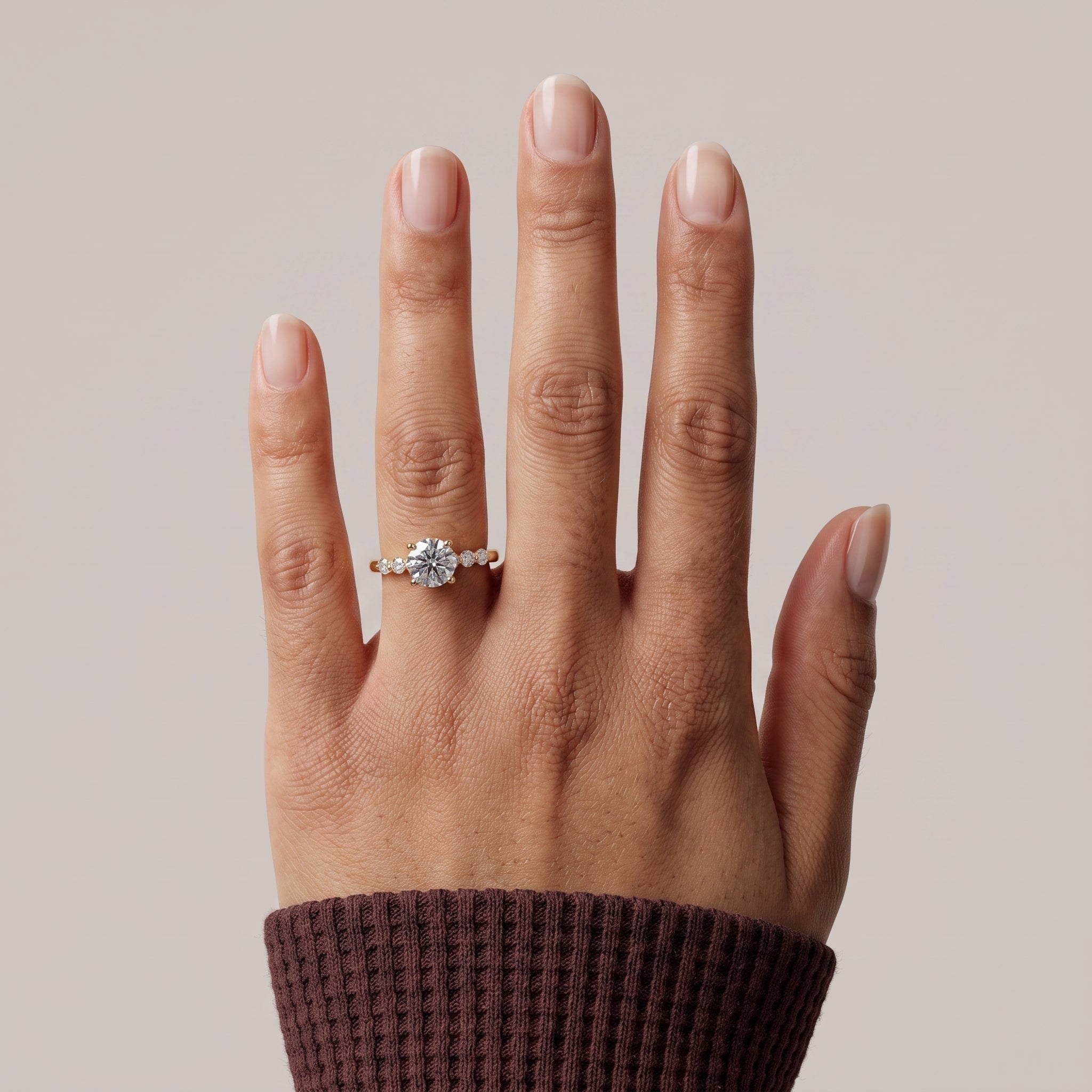 Yellow Gold Round Moissanite Engagement Ring with Side Stones