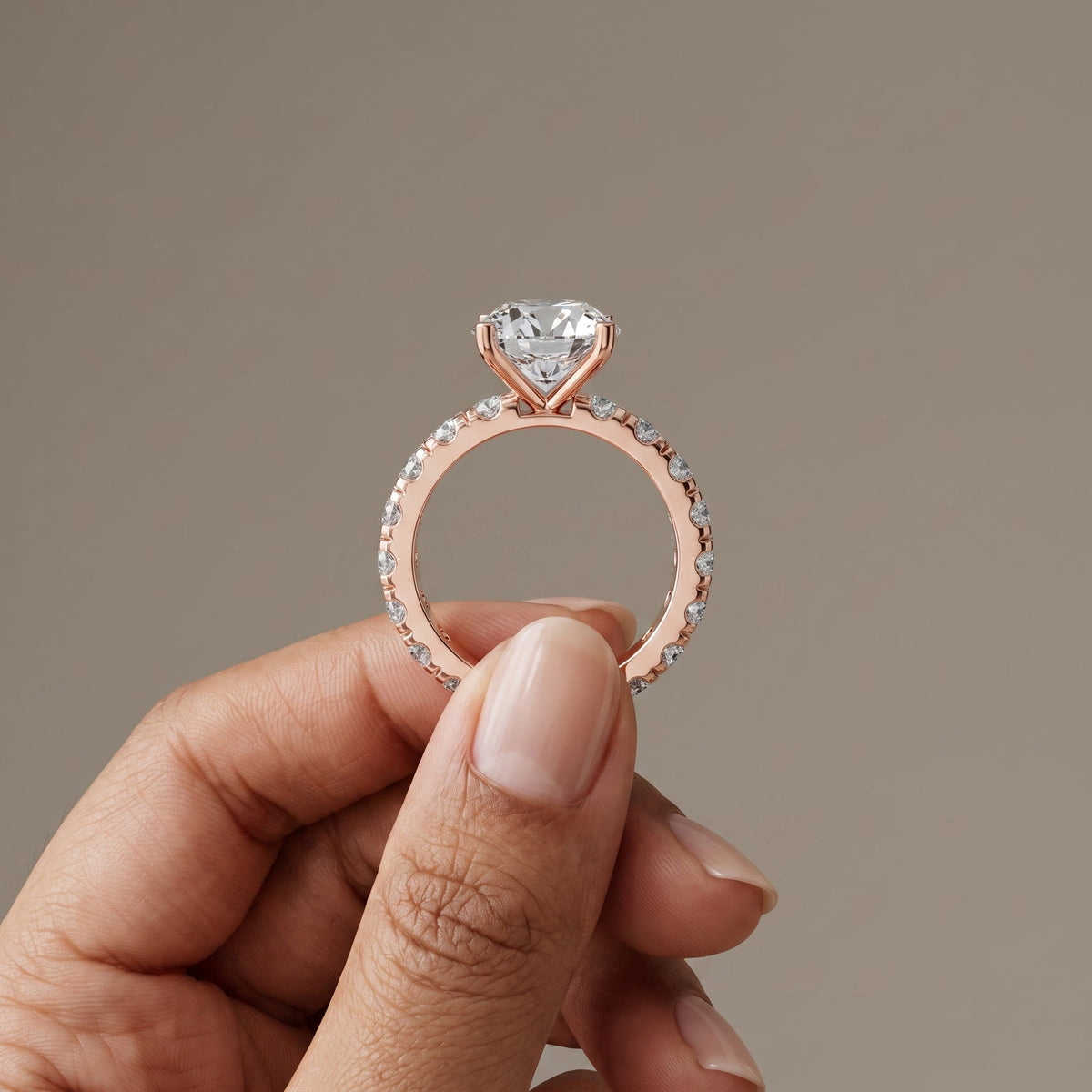 Rose Gold Round Cut Moissanite Engagement Ring with Side Stones