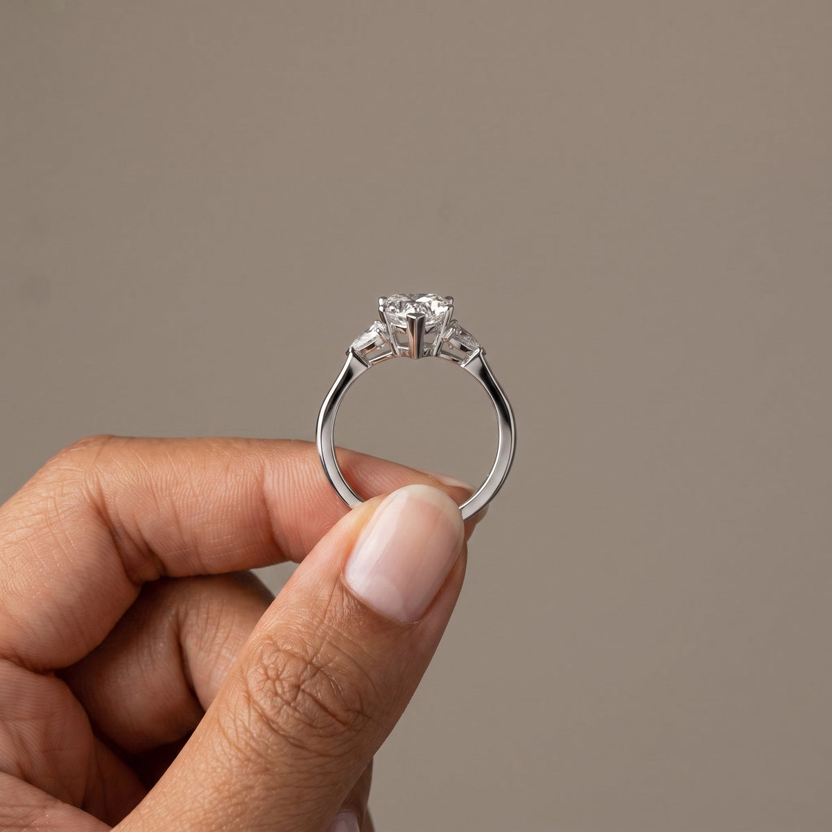 White Metal Heart Cut Moissanite Three Stone Engagement Ring