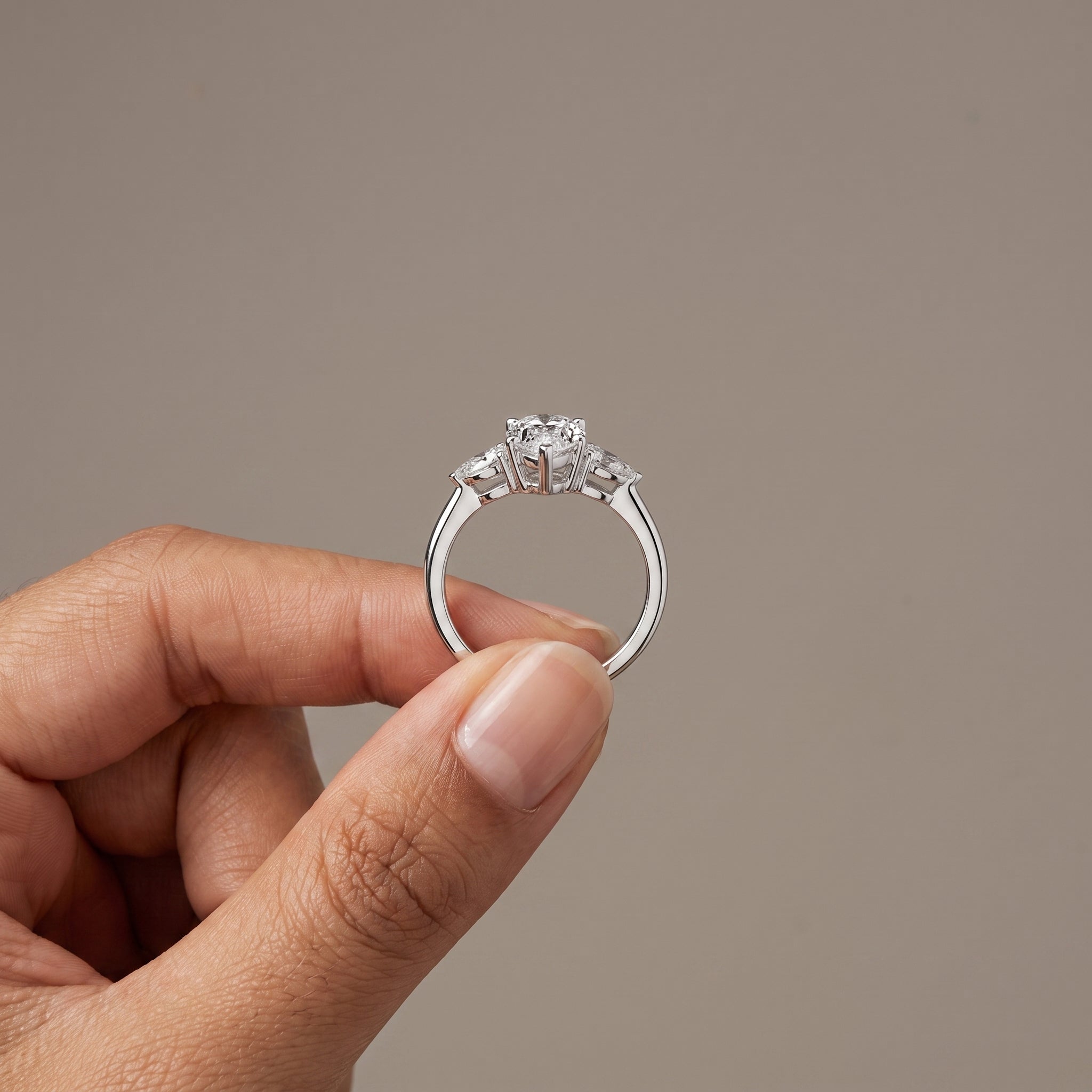 White Gold Pear Cut Moissanite Three Stone Engagement Ring
