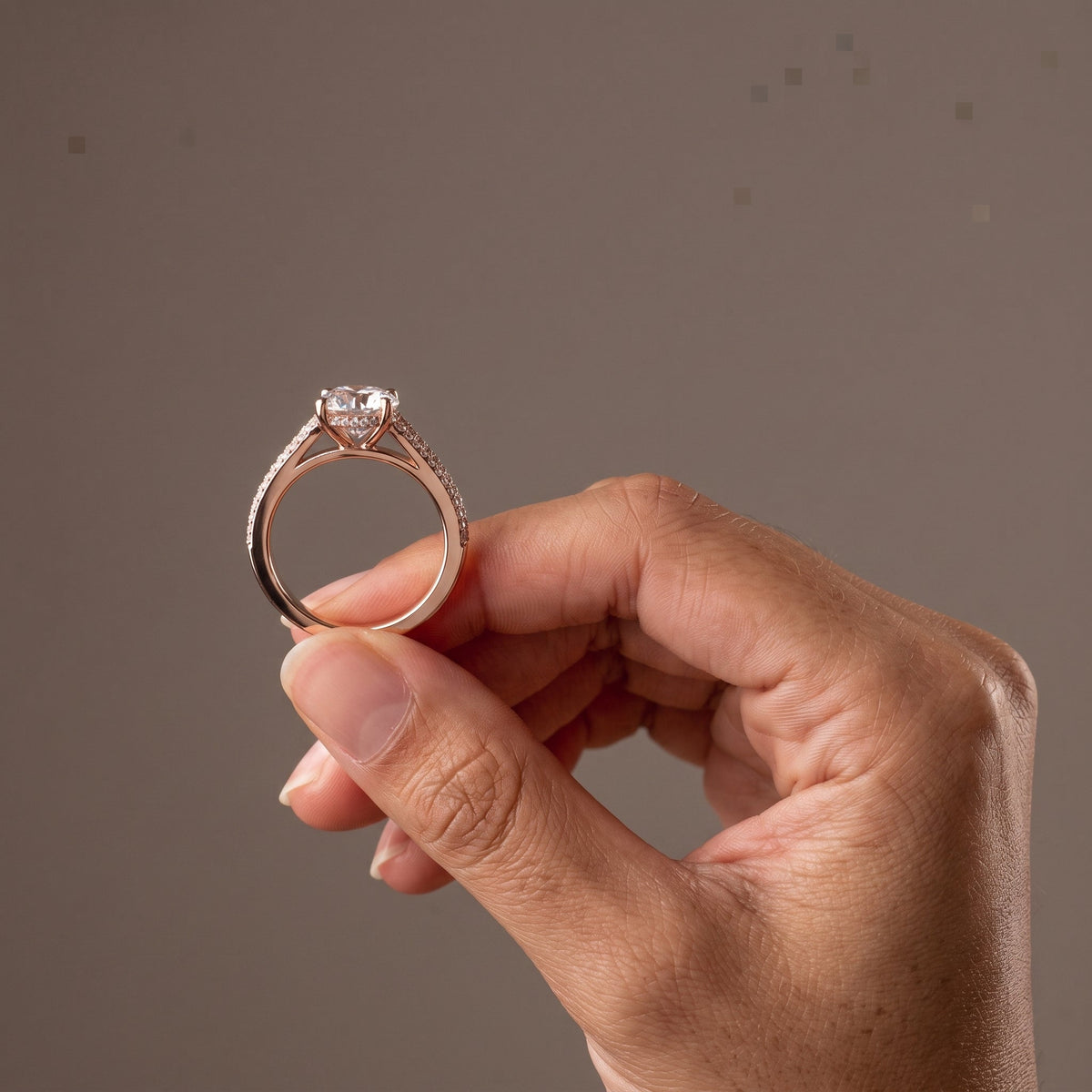 Rose Gold Round Moissanite Engagement Ring with Baguette Accent Band