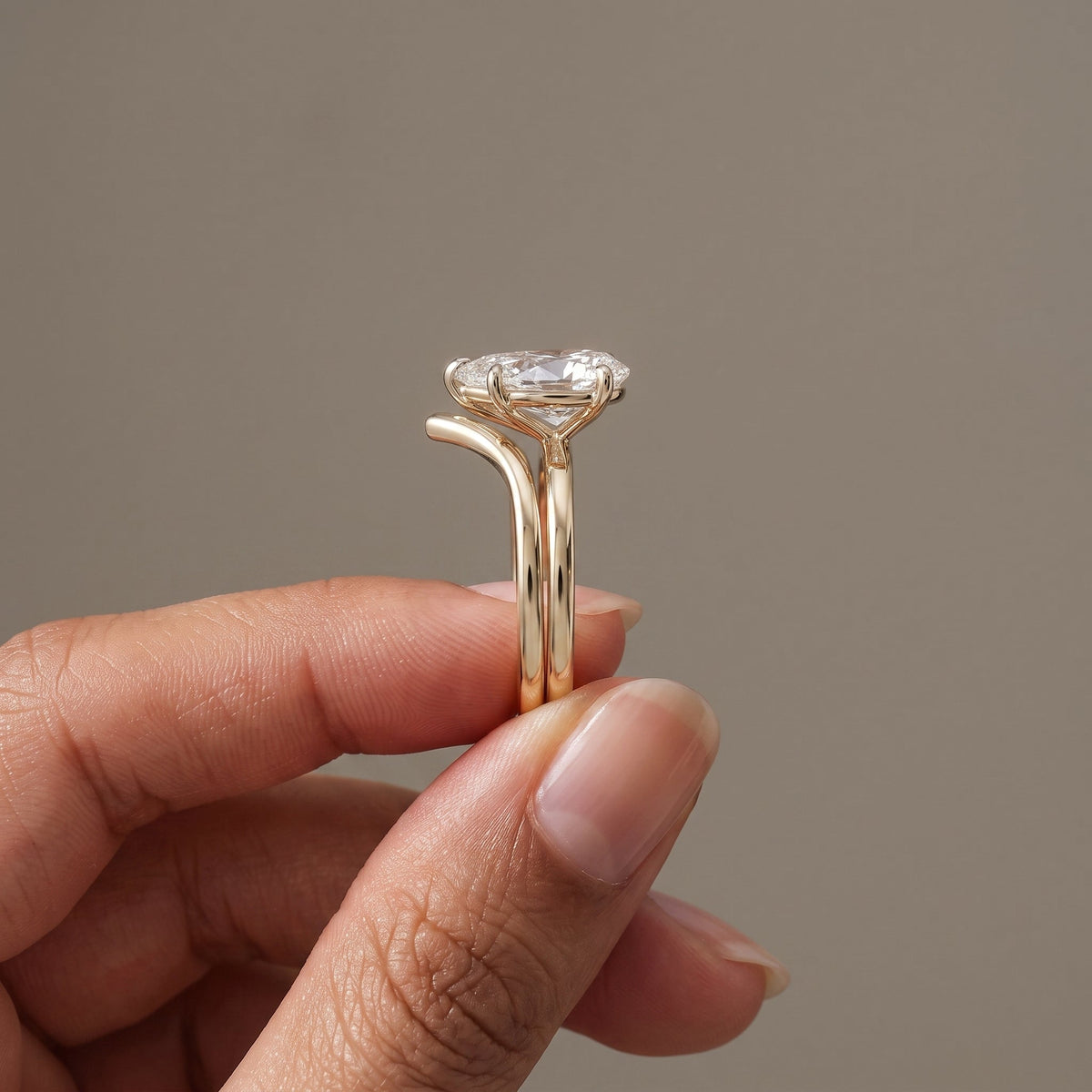Yellow Gold Pear Cut Moissanite Engagement Ring with Chevron Band