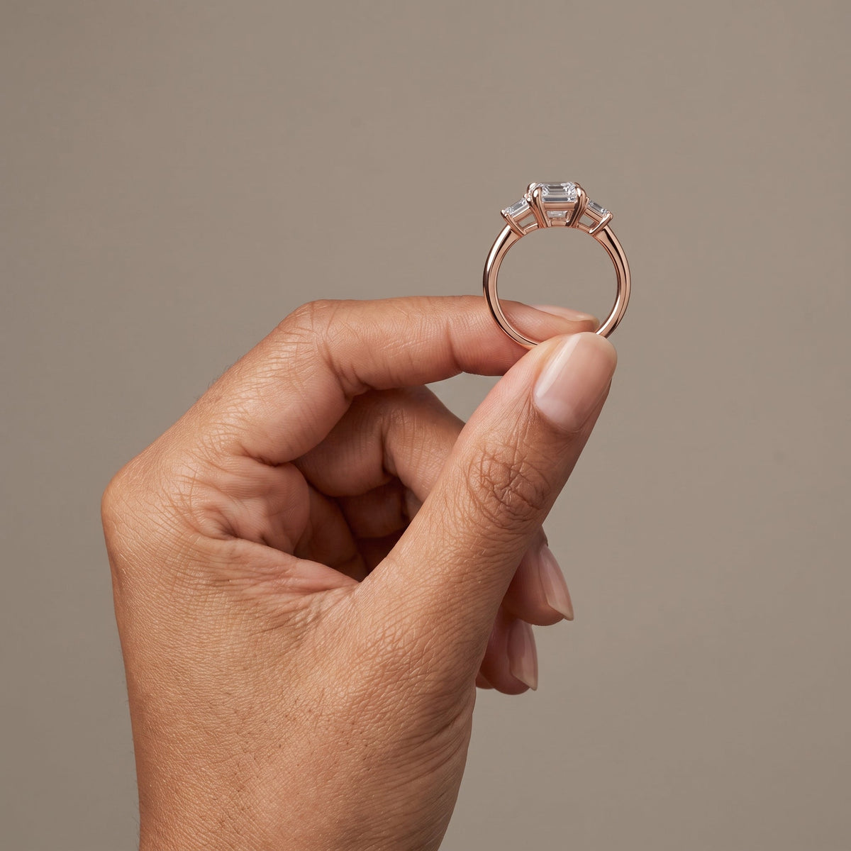 Rose Gold Emerald Cut Moissanite Three Stone Engagement Ring