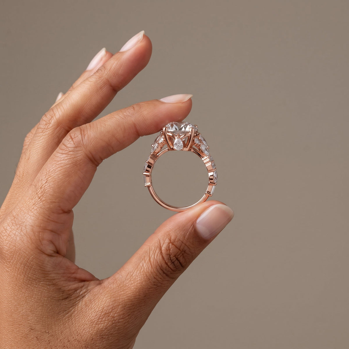 Rose Gold Round Moissanite Engagement Ring with Side Accent Stones