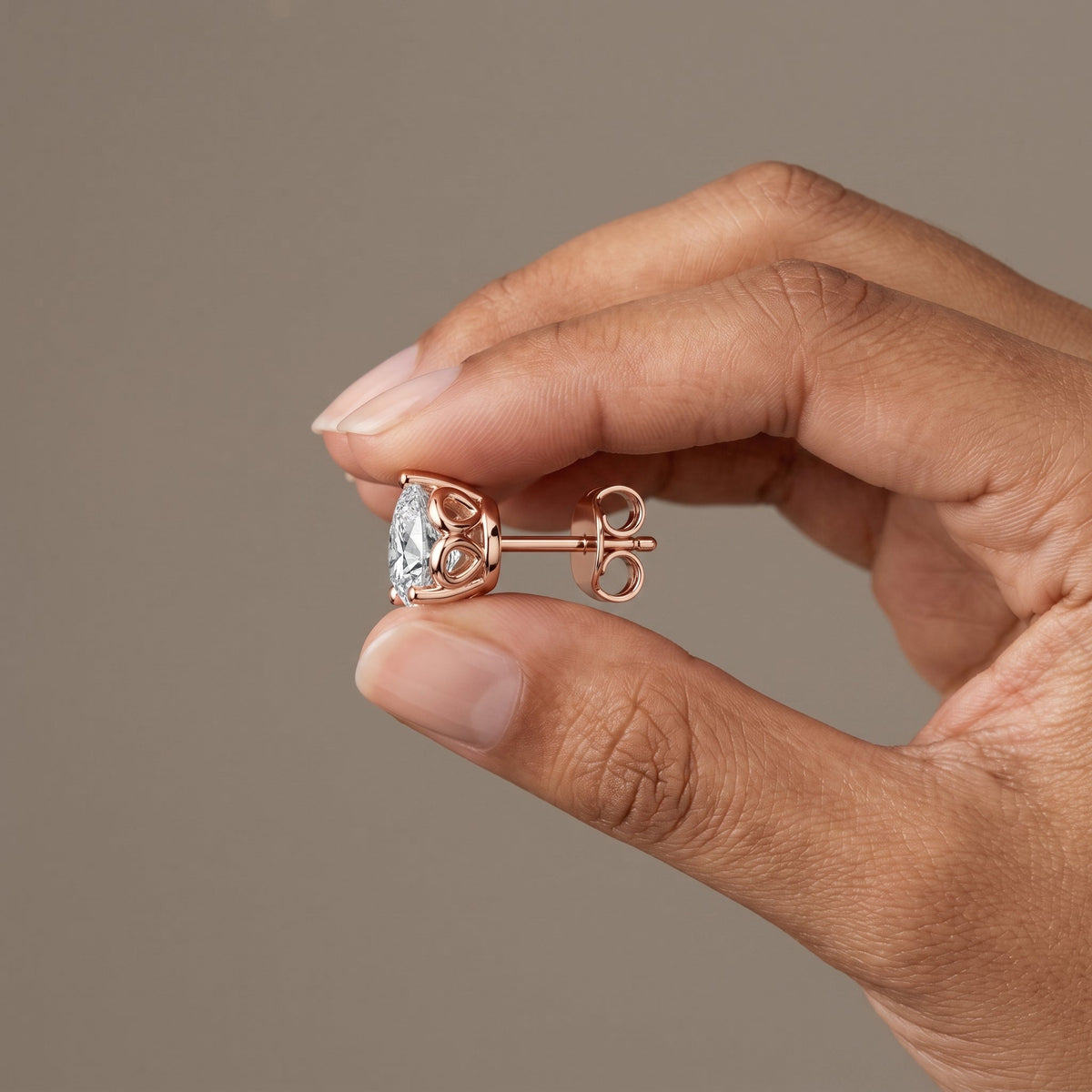 Rose Gold Pear Cut Moissanite Stud Earrings