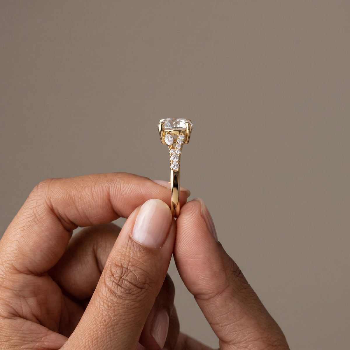 Yellow Gold Round Moissanite Engagement Ring with Leaf Accents